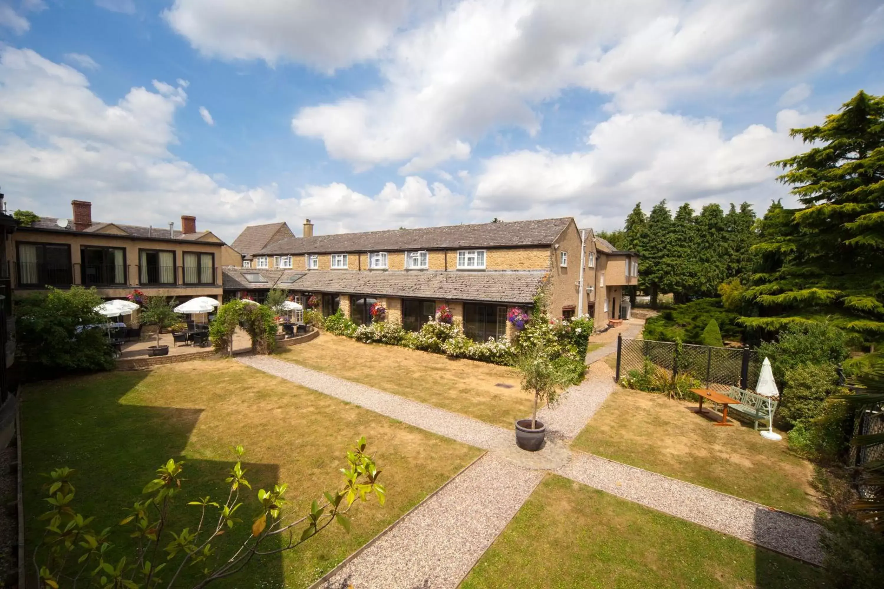 Garden, Property Building in The Holt Hotel