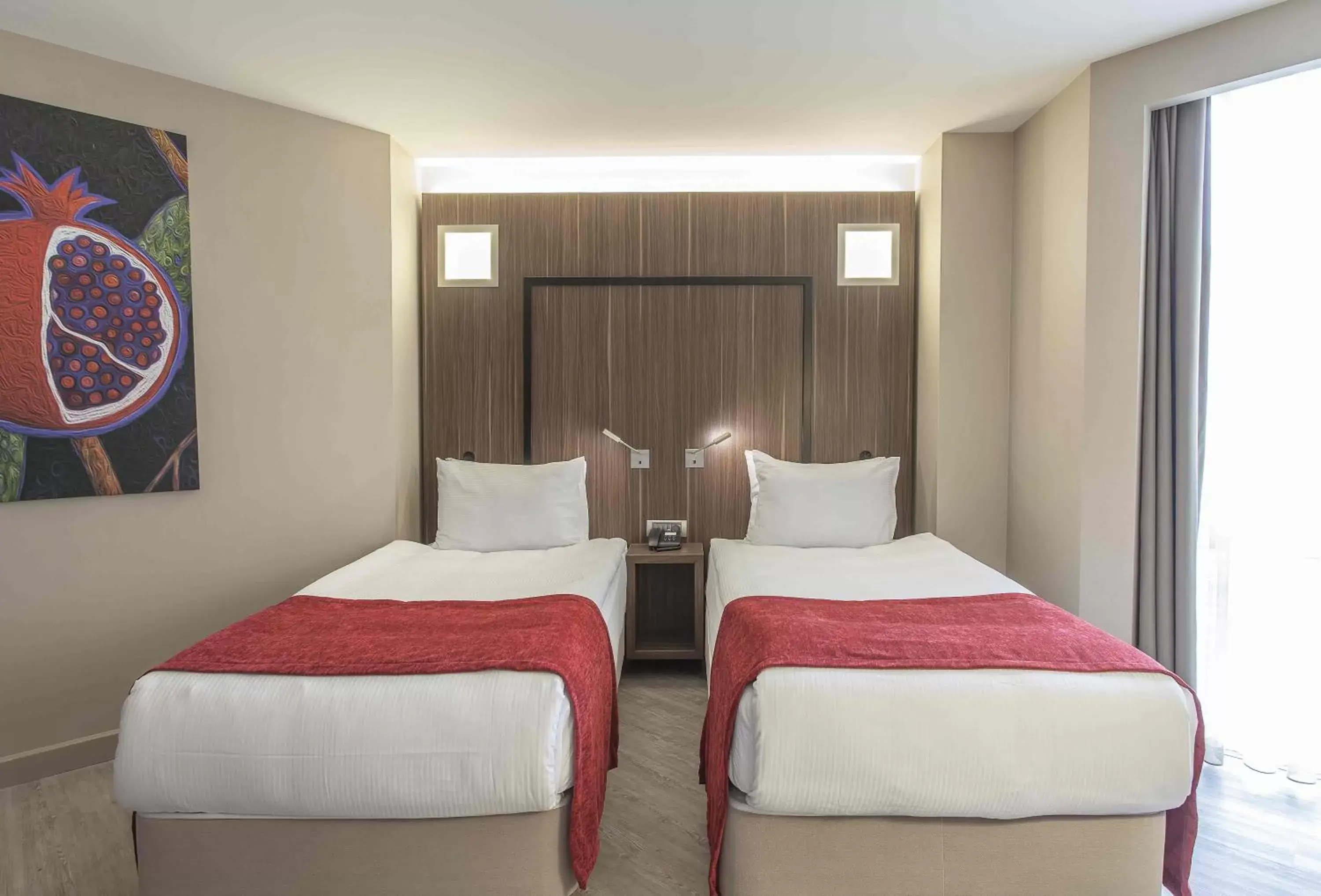 Photo of the whole room, Bed in Ramada Encore by Wyndham Izmir