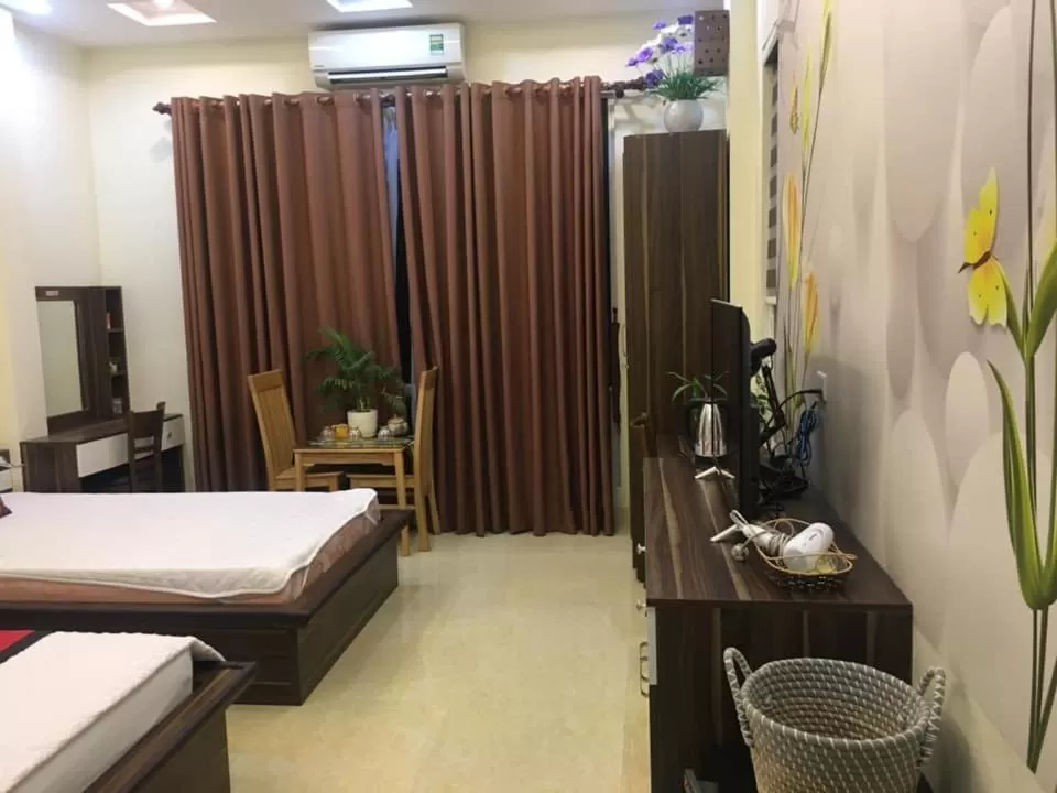 Bed in Friendly Home Hotel