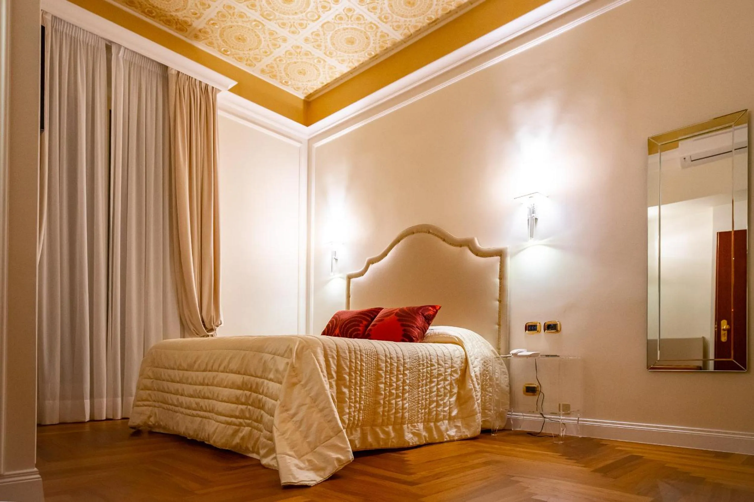 Bed in Boutique Hotel Puccini