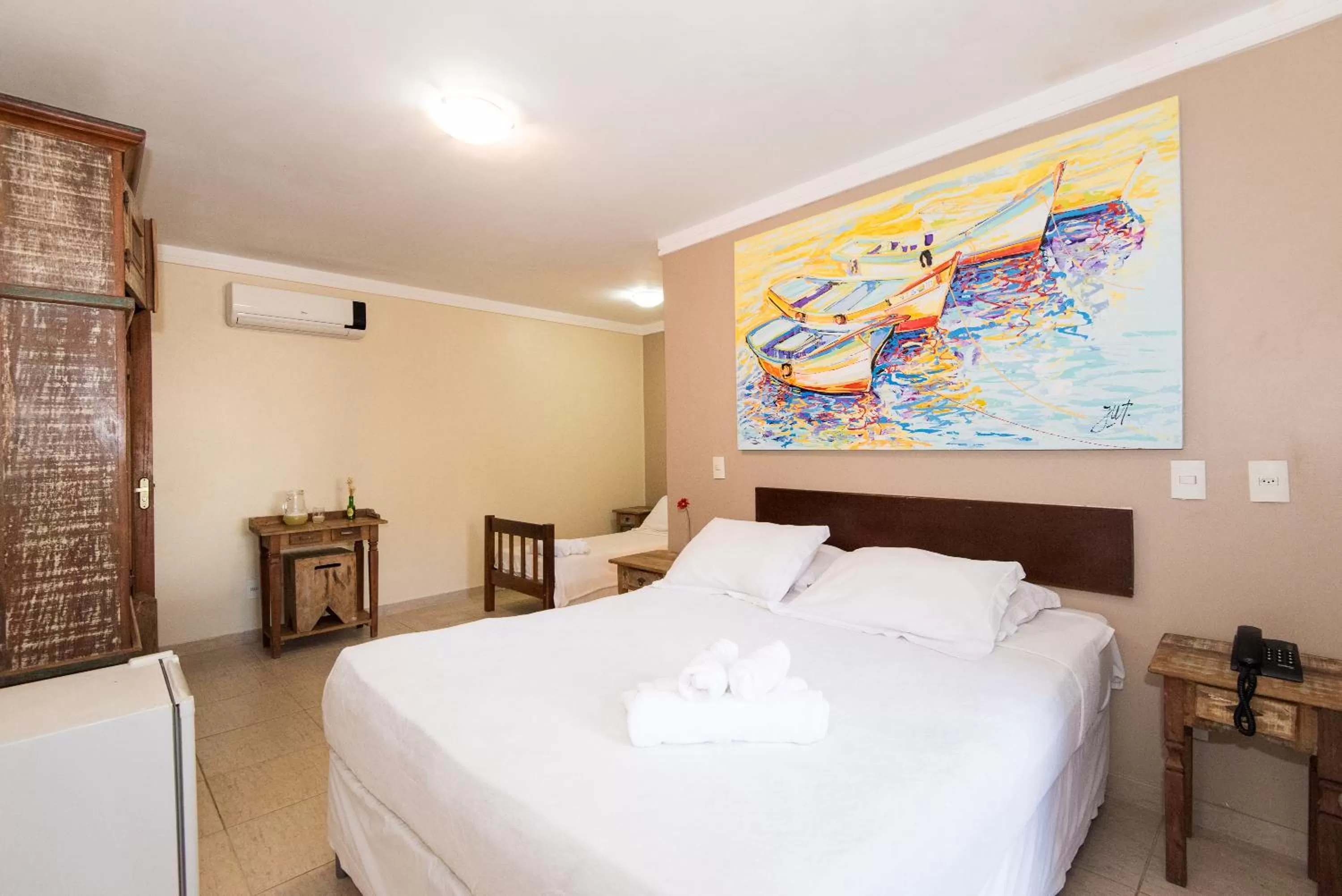 Bed in Pousada La Dolce Vita