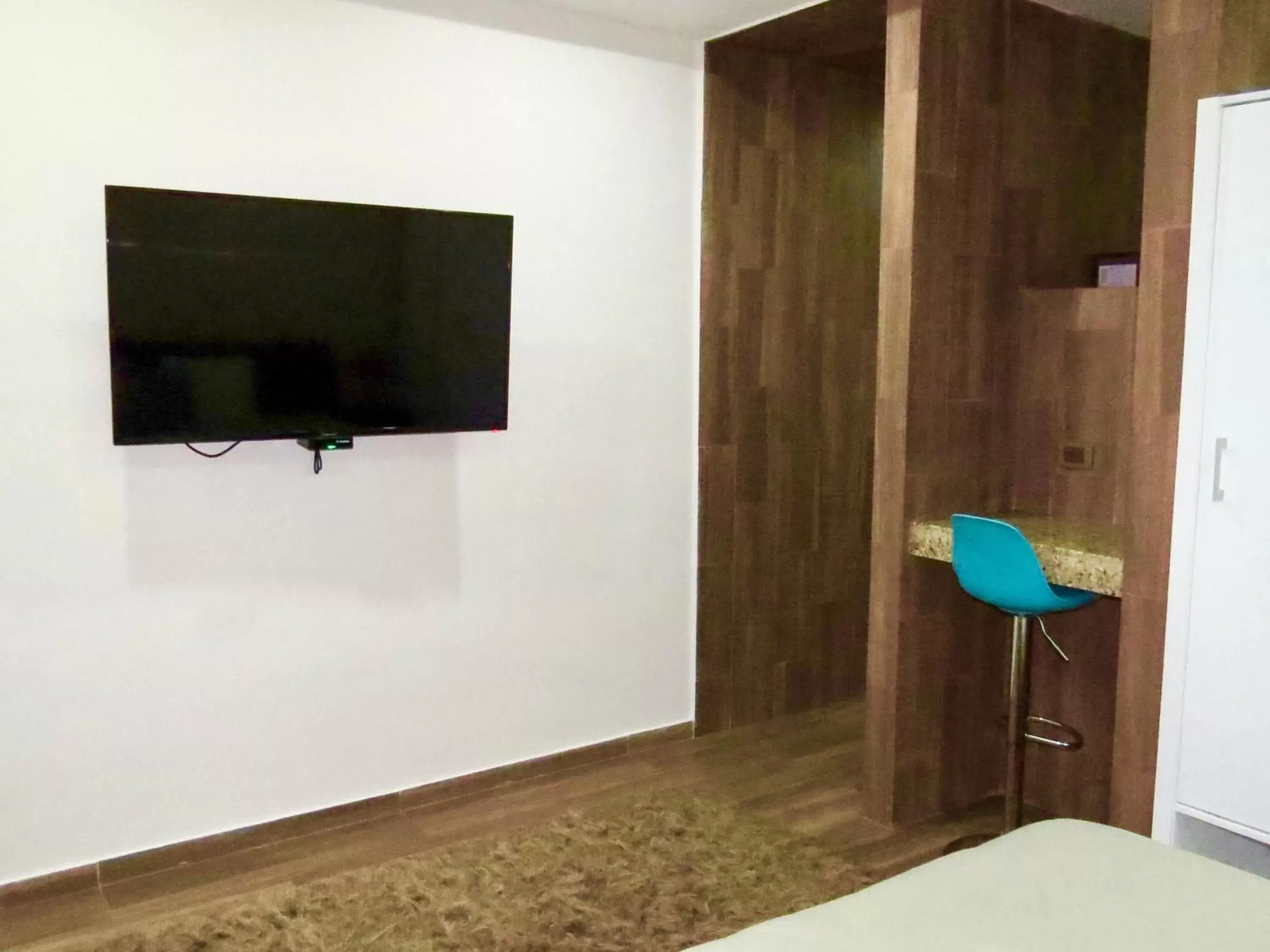 TV and multimedia, TV/Entertainment Center in PALMARENA by Nah Hotels