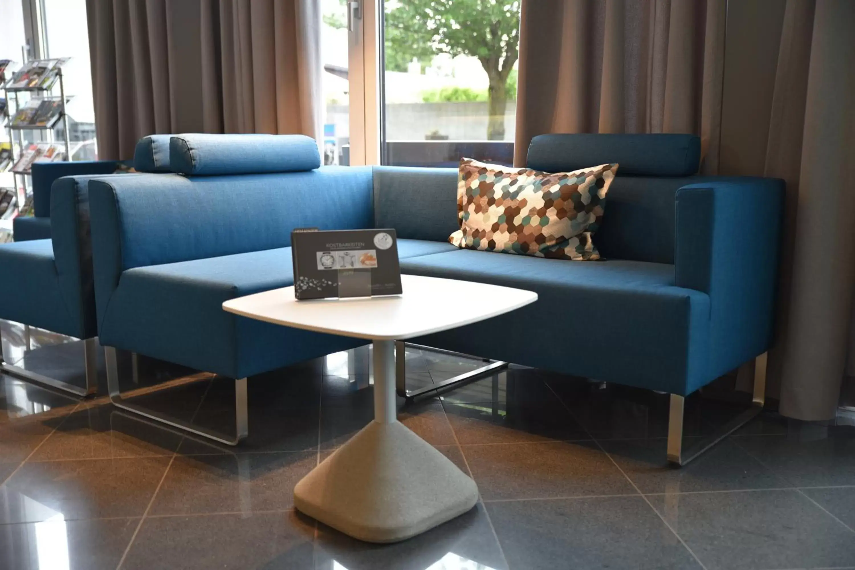 Property building, Seating Area in Holiday Inn - Salzburg City, an IHG Hotel