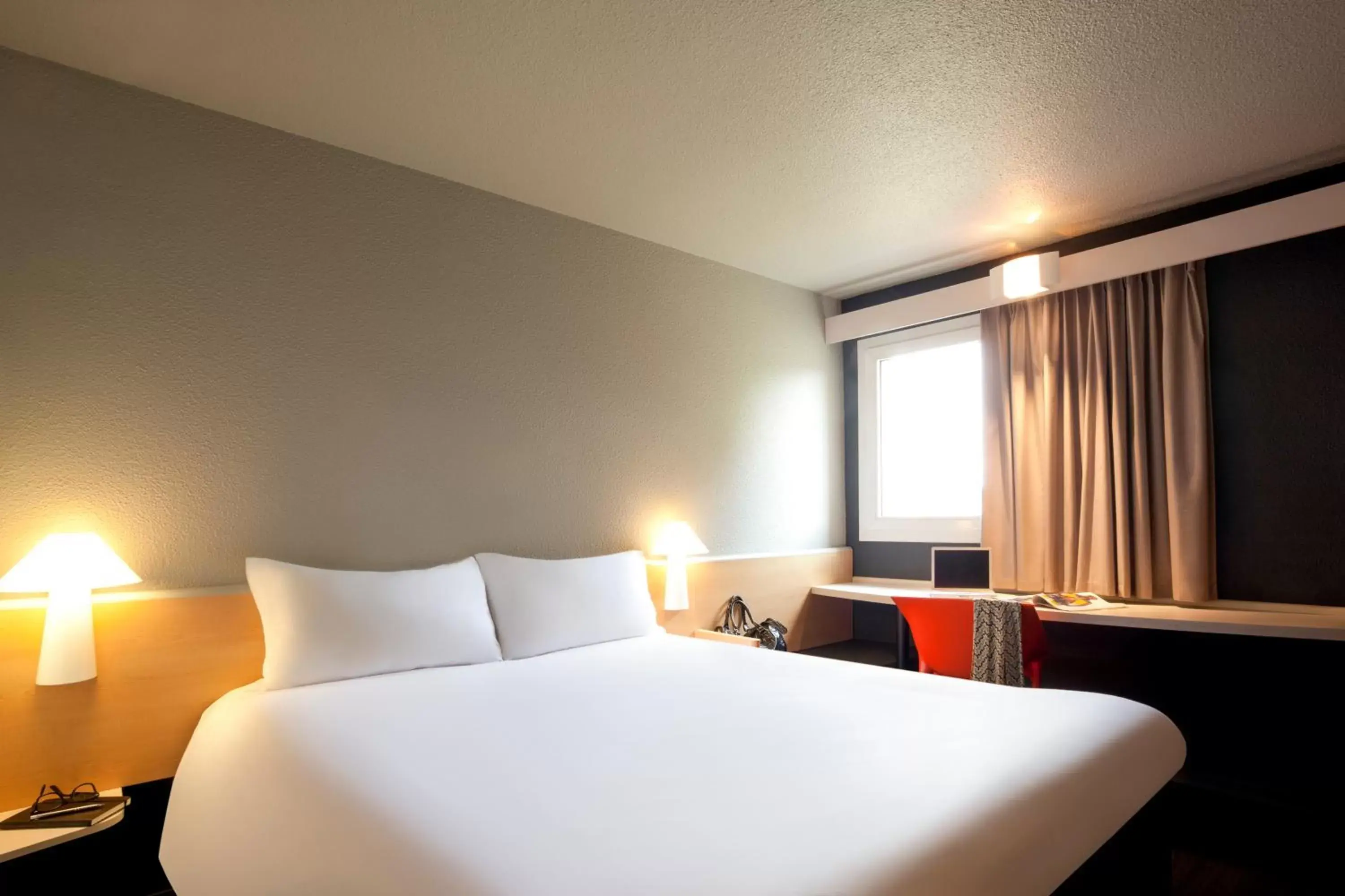 Bed in ibis Mulhouse Ile Napoleon