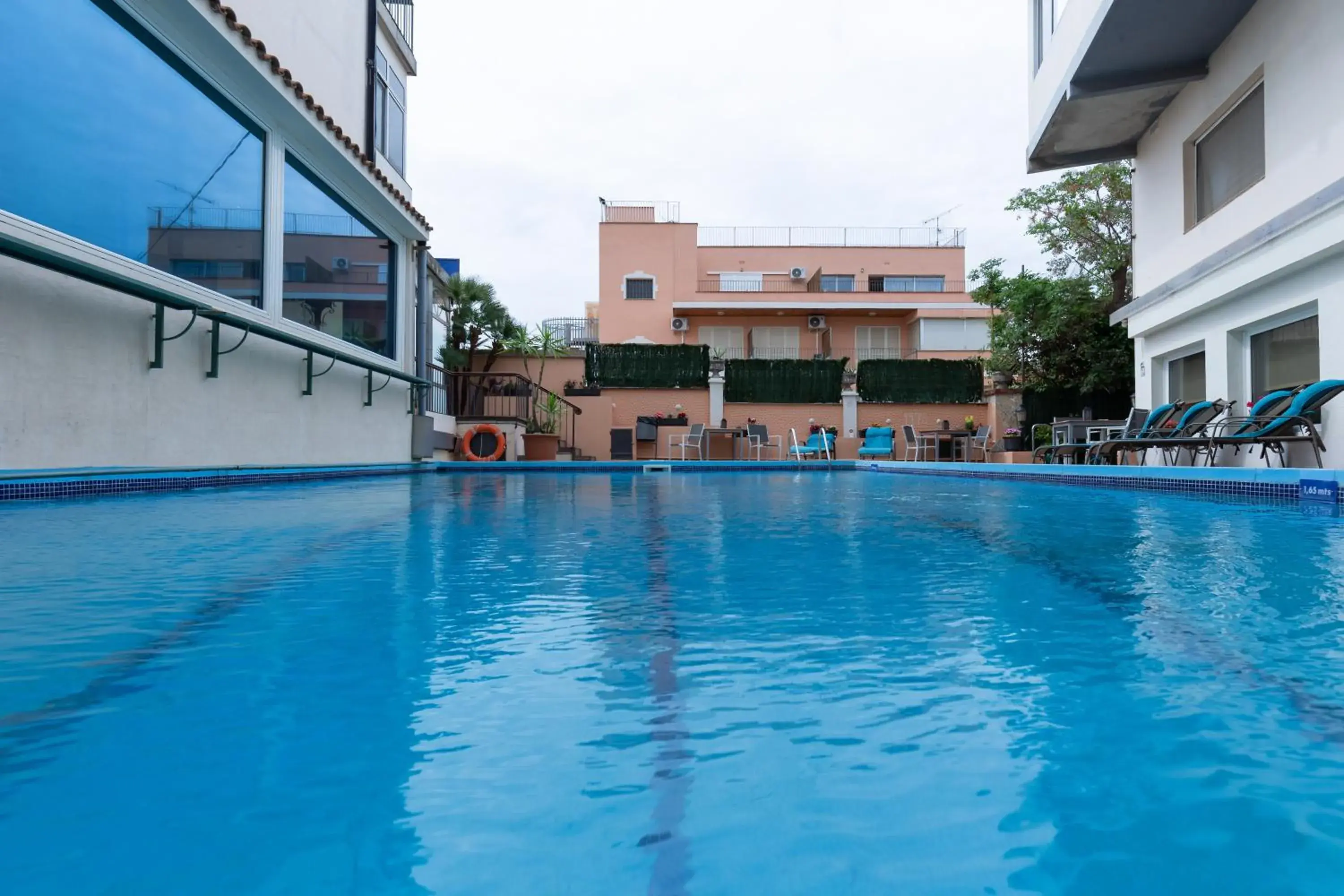 Swimming Pool in Hospedium Hotel Restaurant Trav