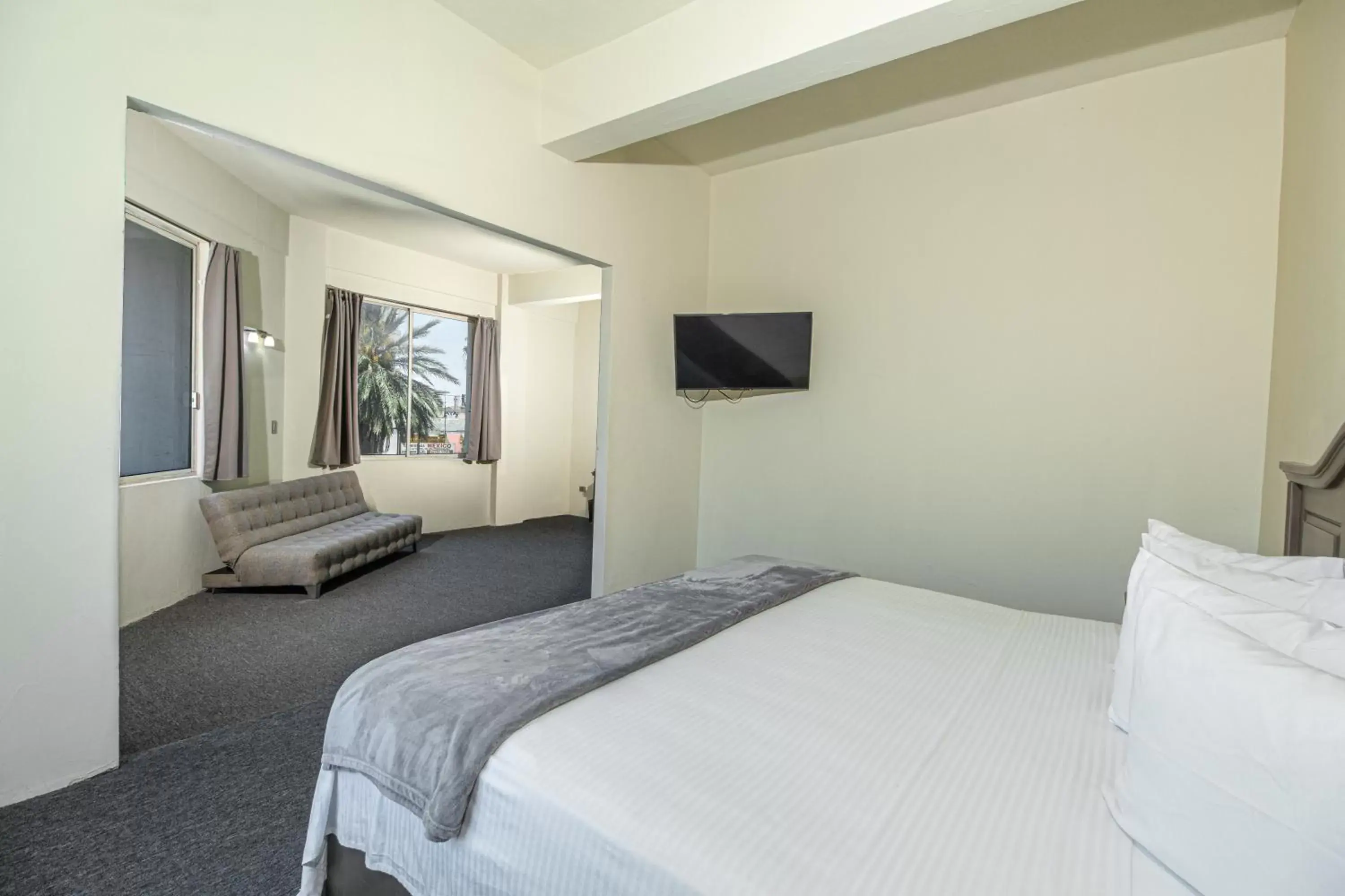 Bedroom, Bed in Hotel Plaza del Arco - Monterrey