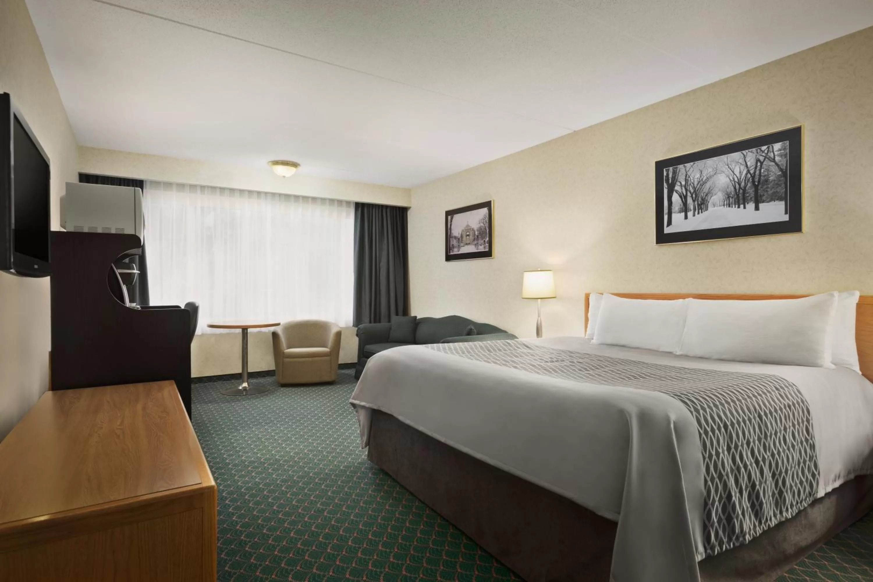 Photo of the whole room, Bed in Travelodge by Wyndham Winnipeg East