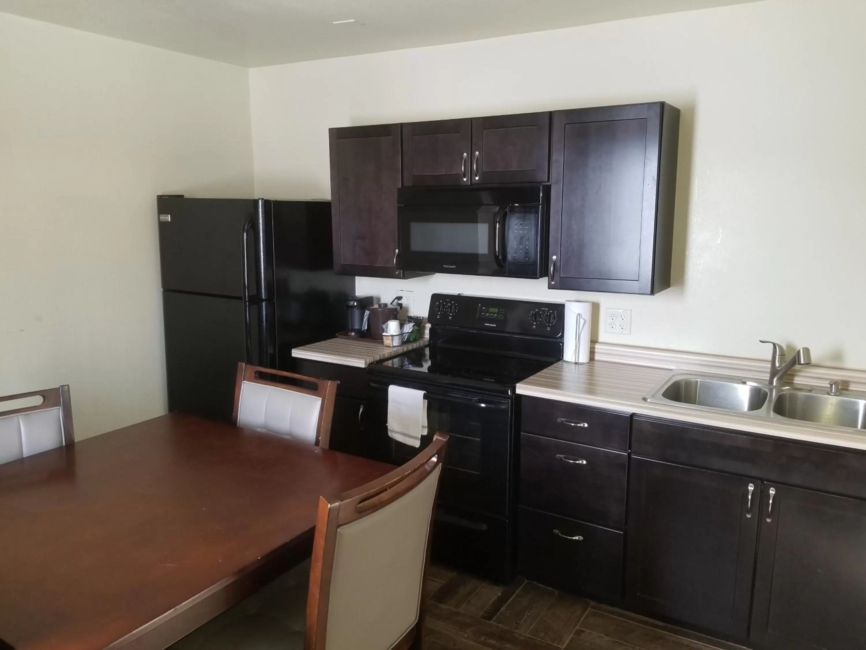Kitchen or kitchenette in Baymont by Wyndham Eau Claire WI