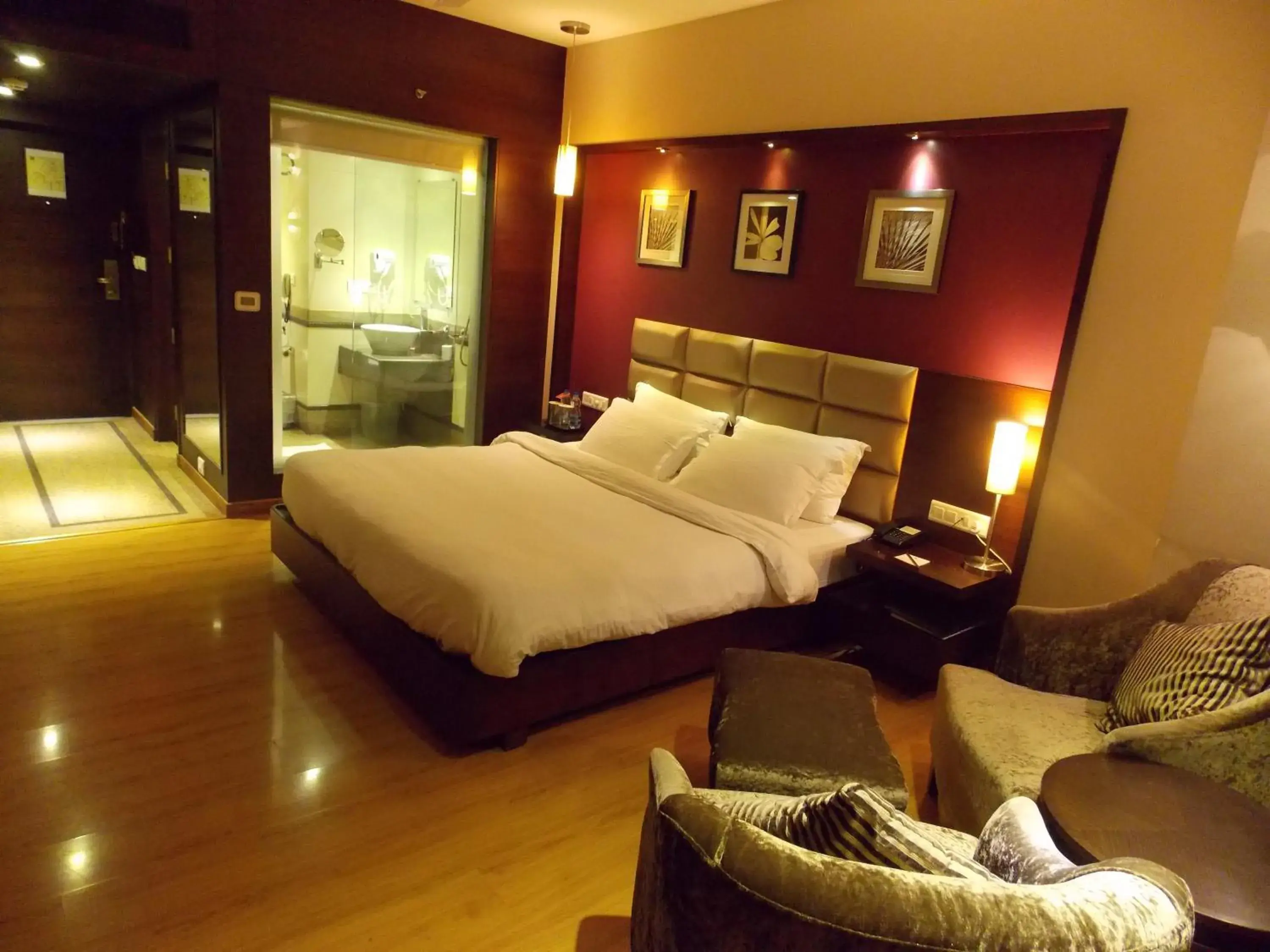 Photo of the whole room, Bed in Lords Plaza Surat