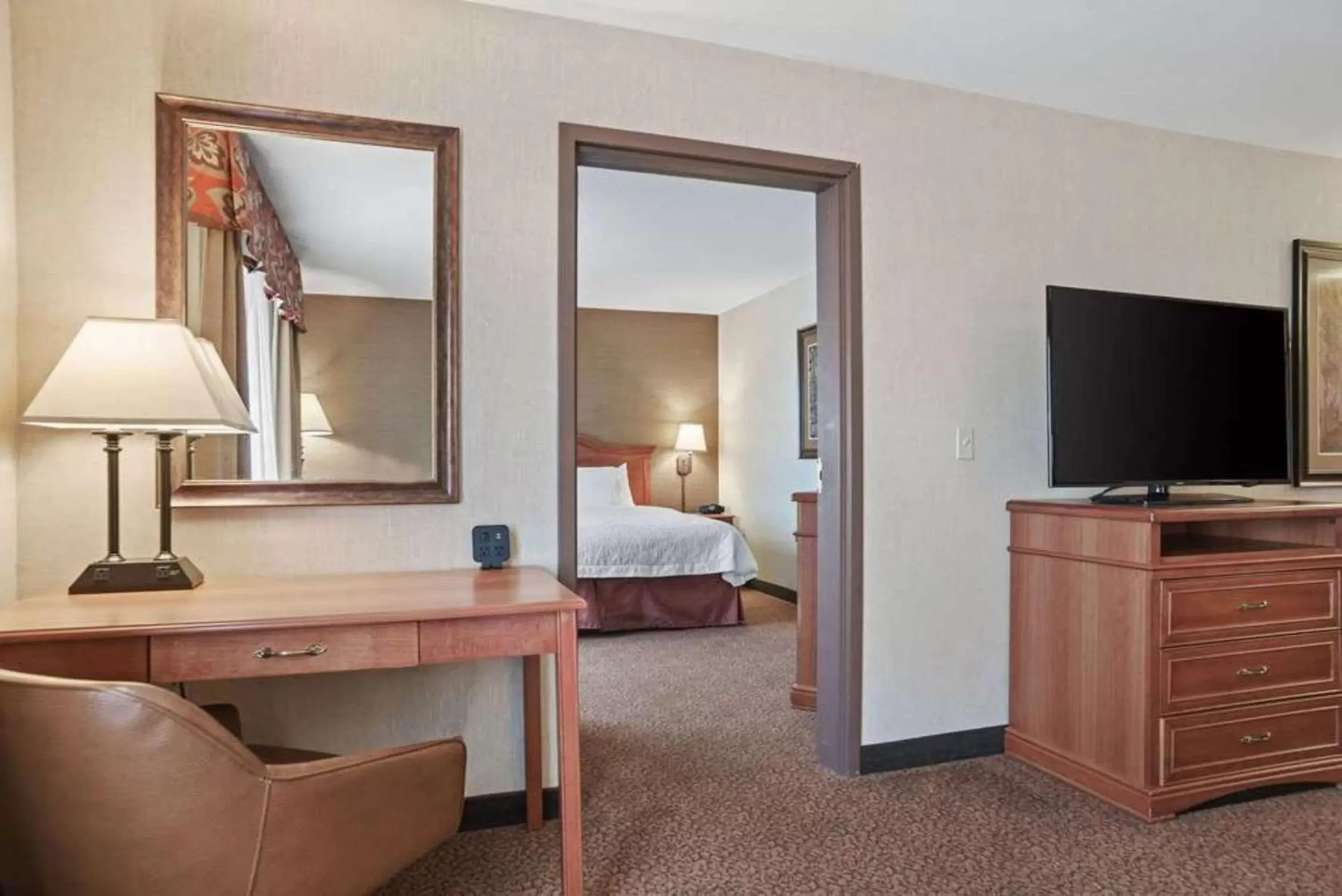 Bedroom, TV/Entertainment Center in Comfort Inn & Suites Rapid City near Mt Rushmore