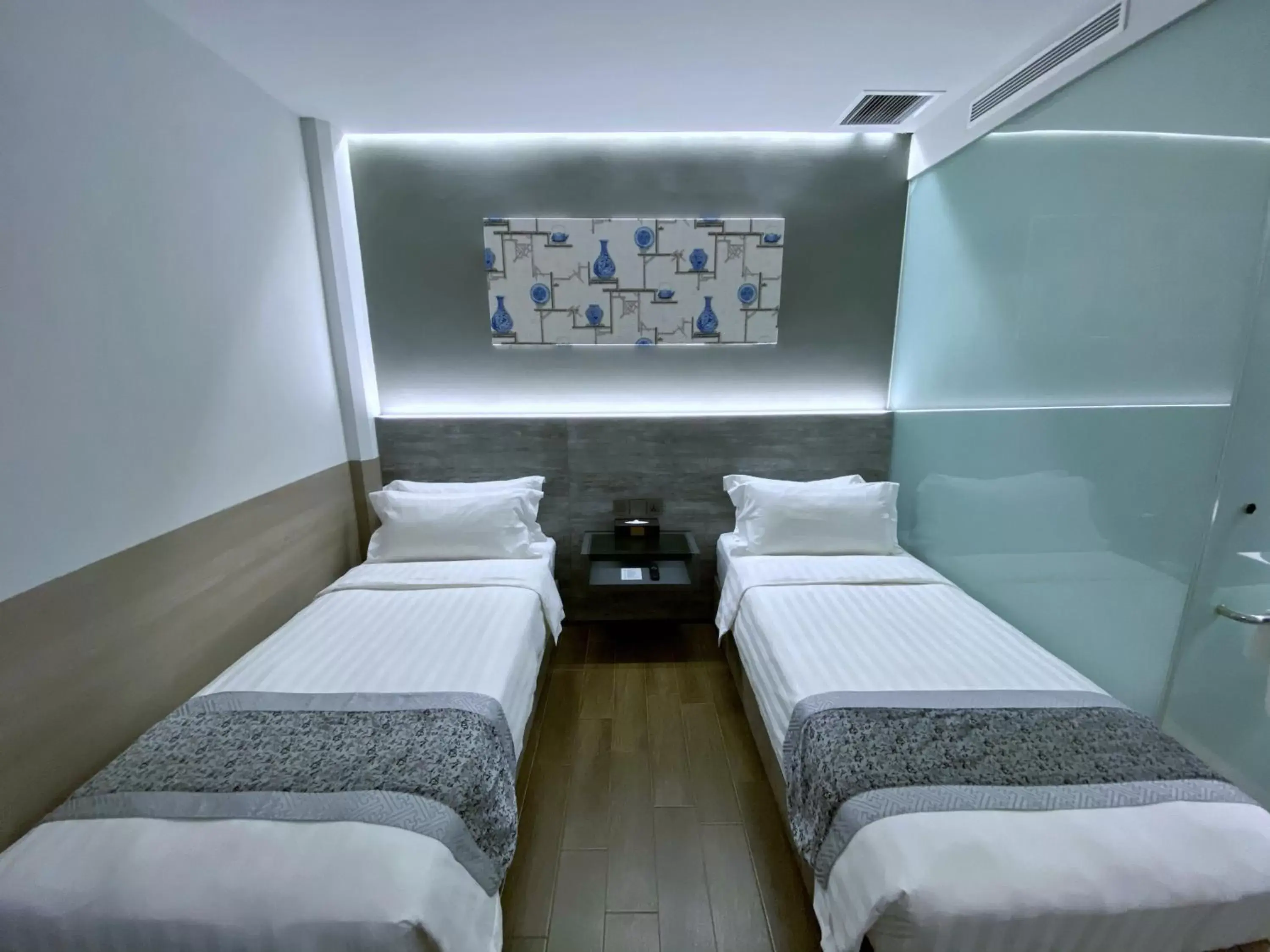 Bed in Bliss Hotel Singapore