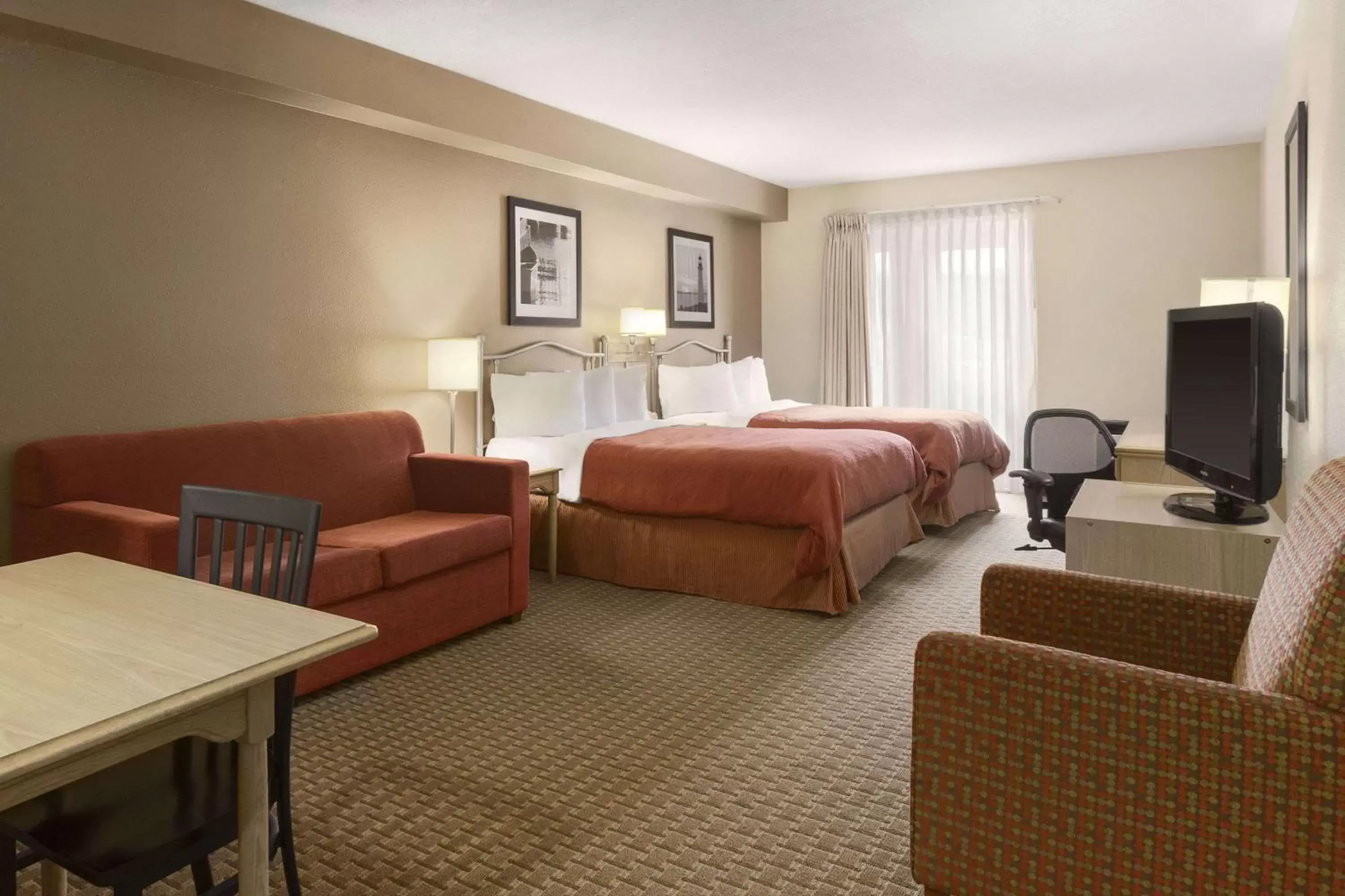 Photo of the whole room in Travelodge Suites by Wyndham Saint John