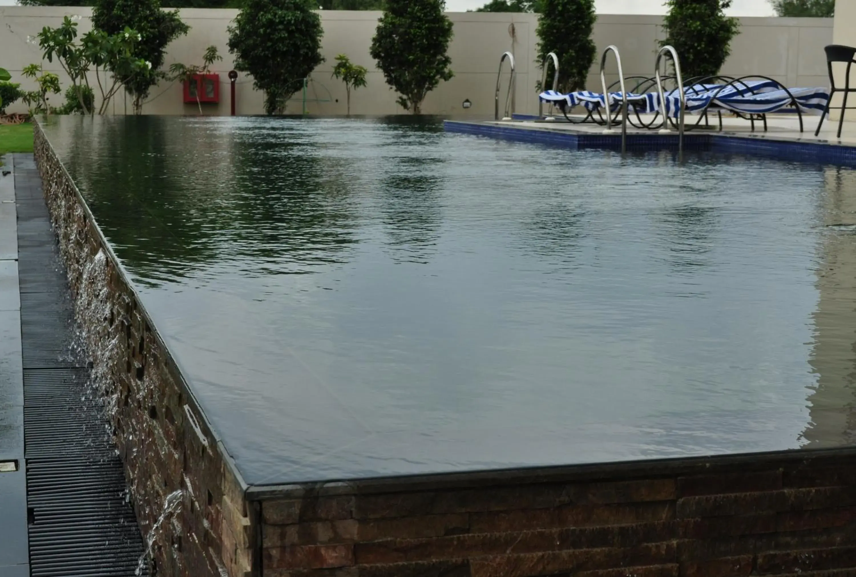 Swimming pool in Ramada by Wyndham Jaipur Jaisinghpura Swimming pool in Ramada by Wyndham Jaipur Jaisinghpura