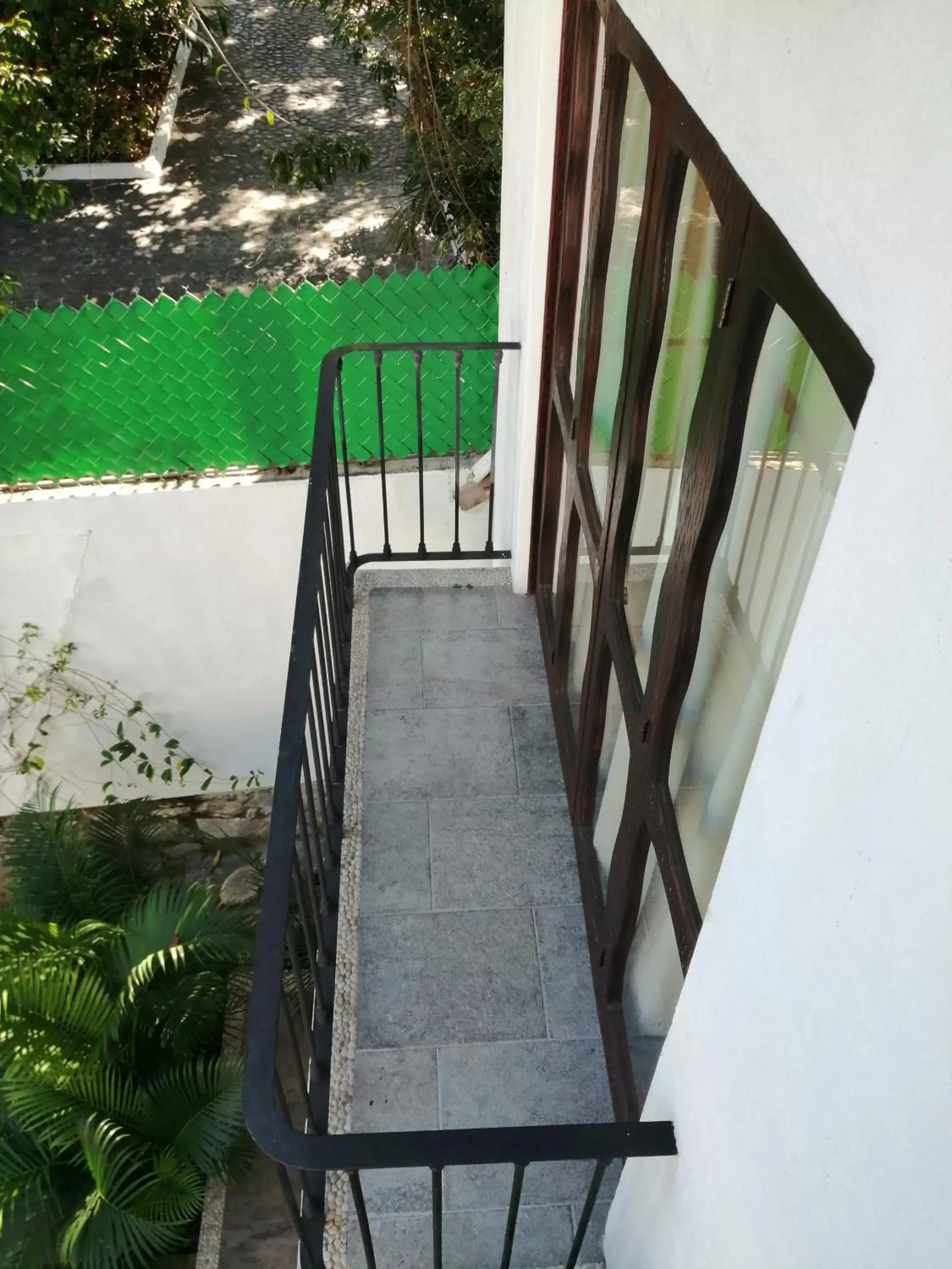 Balcony/Terrace, Pool View in Ceiba Studios