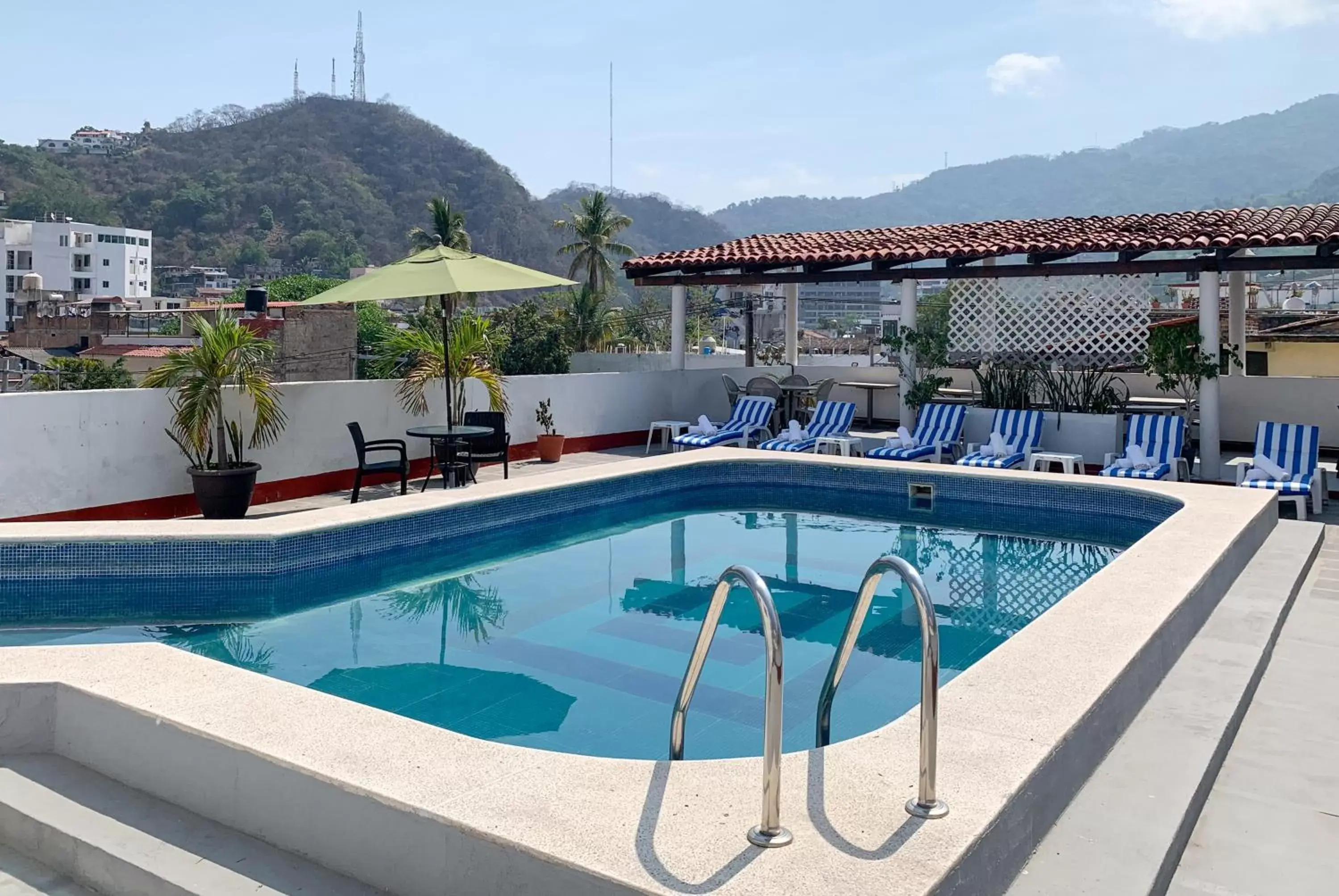 Property building, Swimming Pool in Hotel Pueblito Vallarta