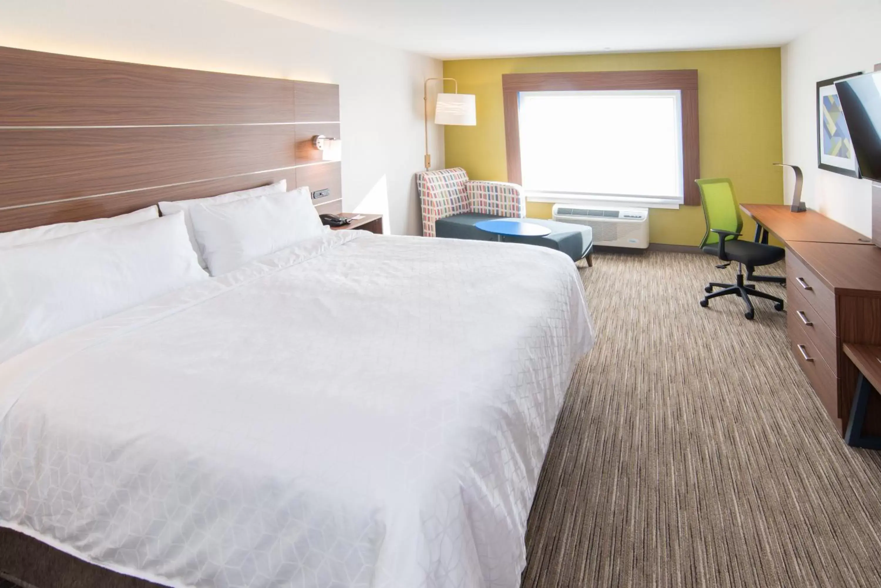 Bed in Holiday Inn Express & Suites - North Battleford, an IHG Hotel