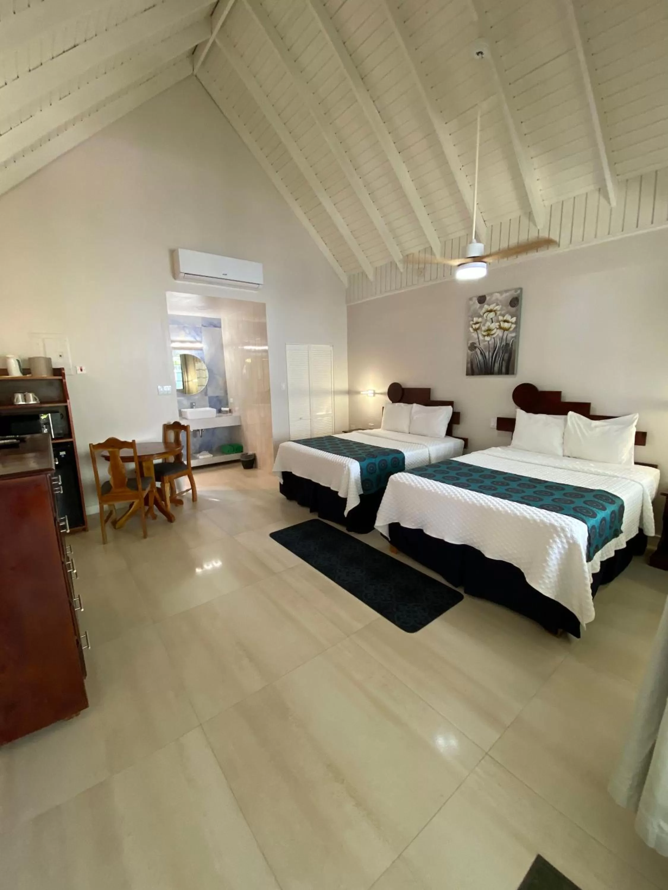 Bed in THE BOARDWALK VILLAGE