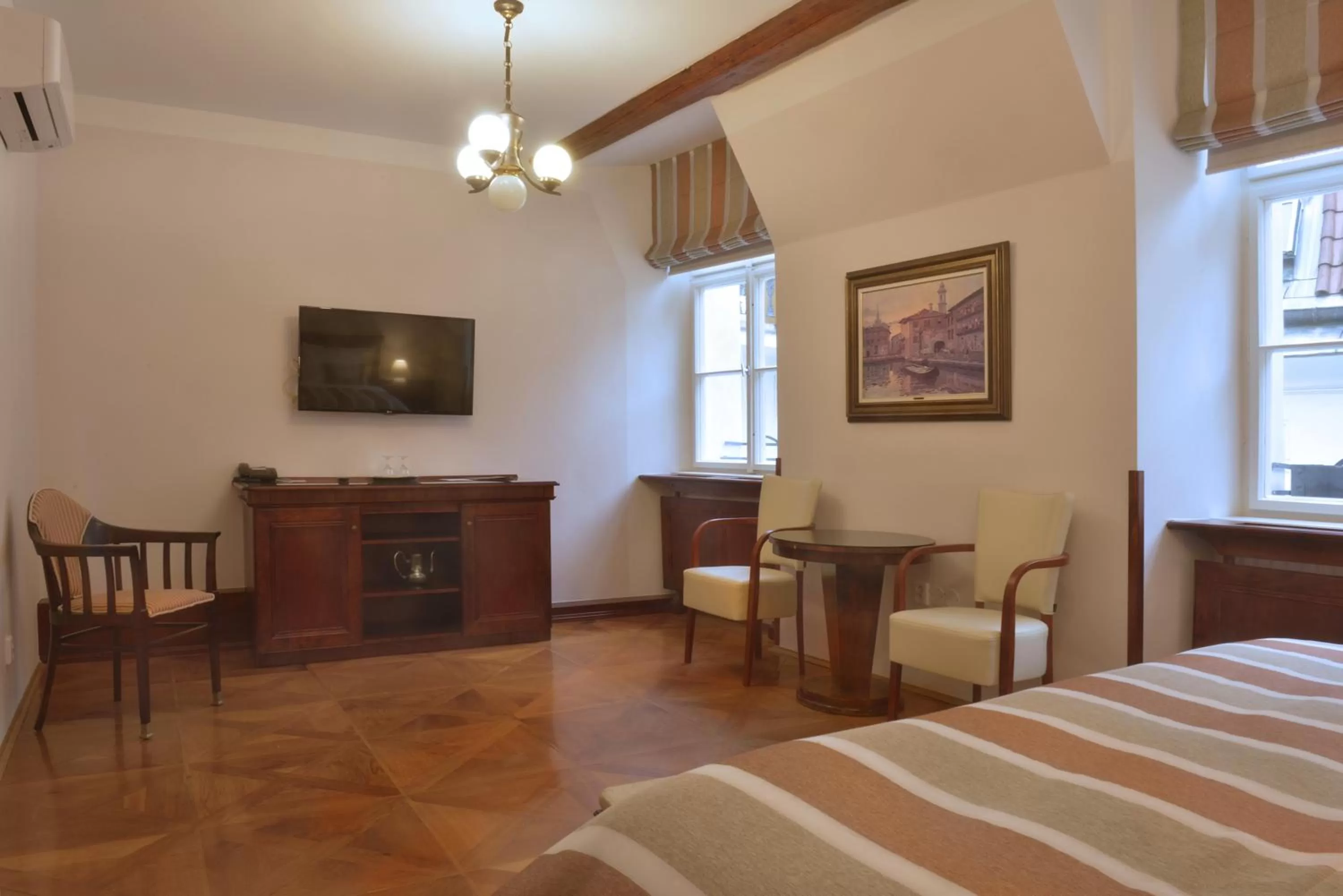 Living room, Bed in Grand Hotel Praha