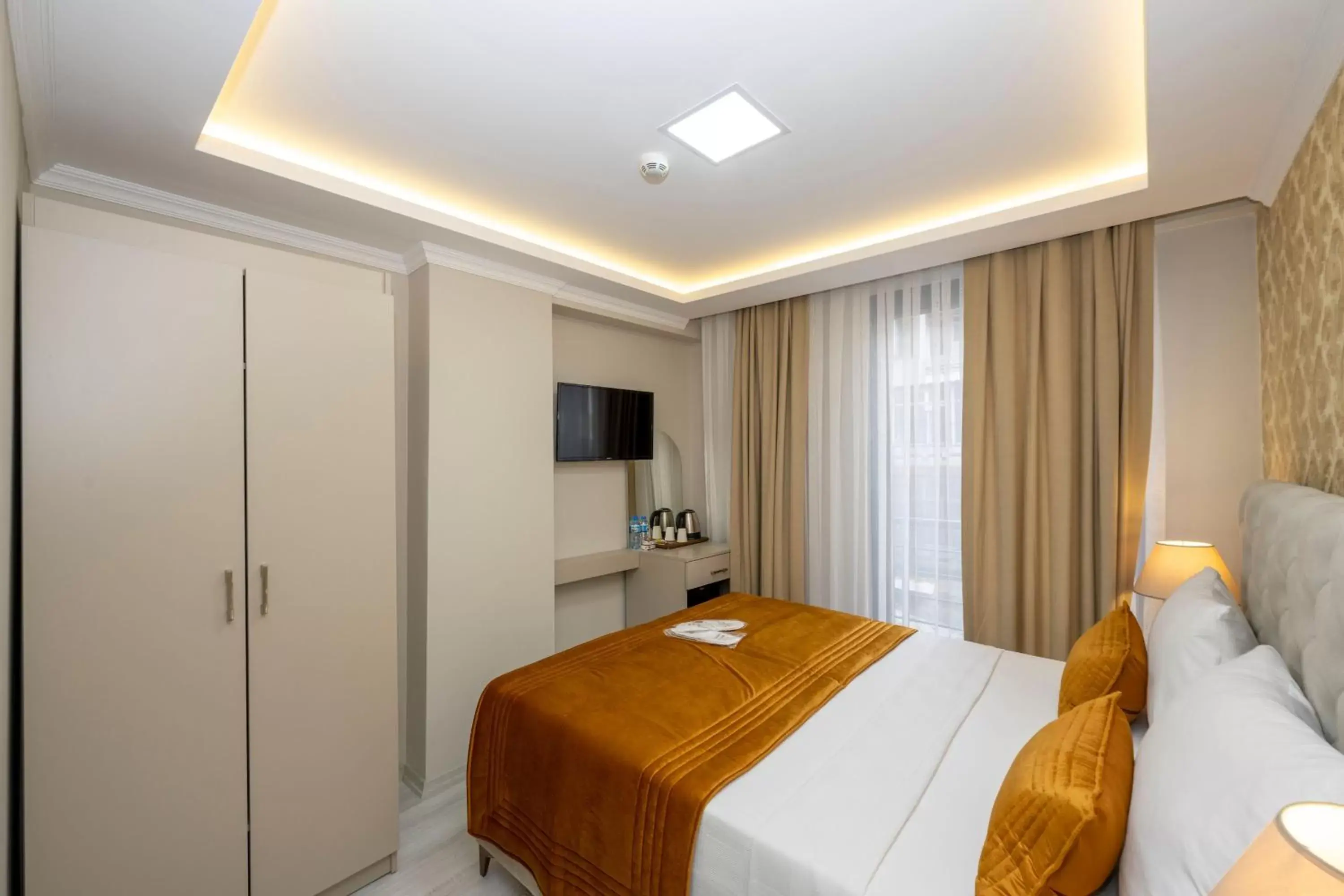 Bed in SKYSTAR DELUXE HOTEL Bed in SKYSTAR DELUXE HOTEL