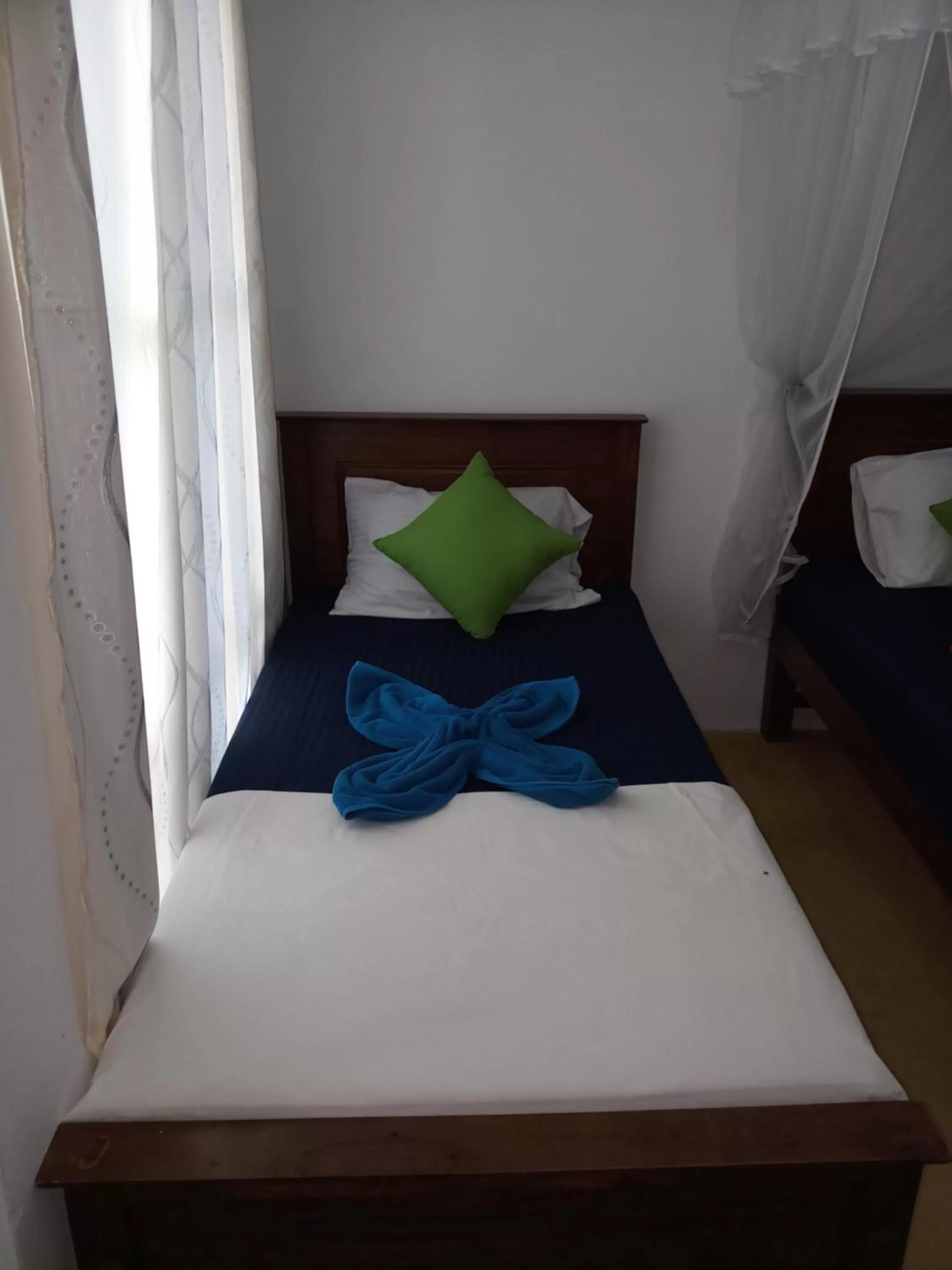 Bed in Turtle Bay Beach Resort