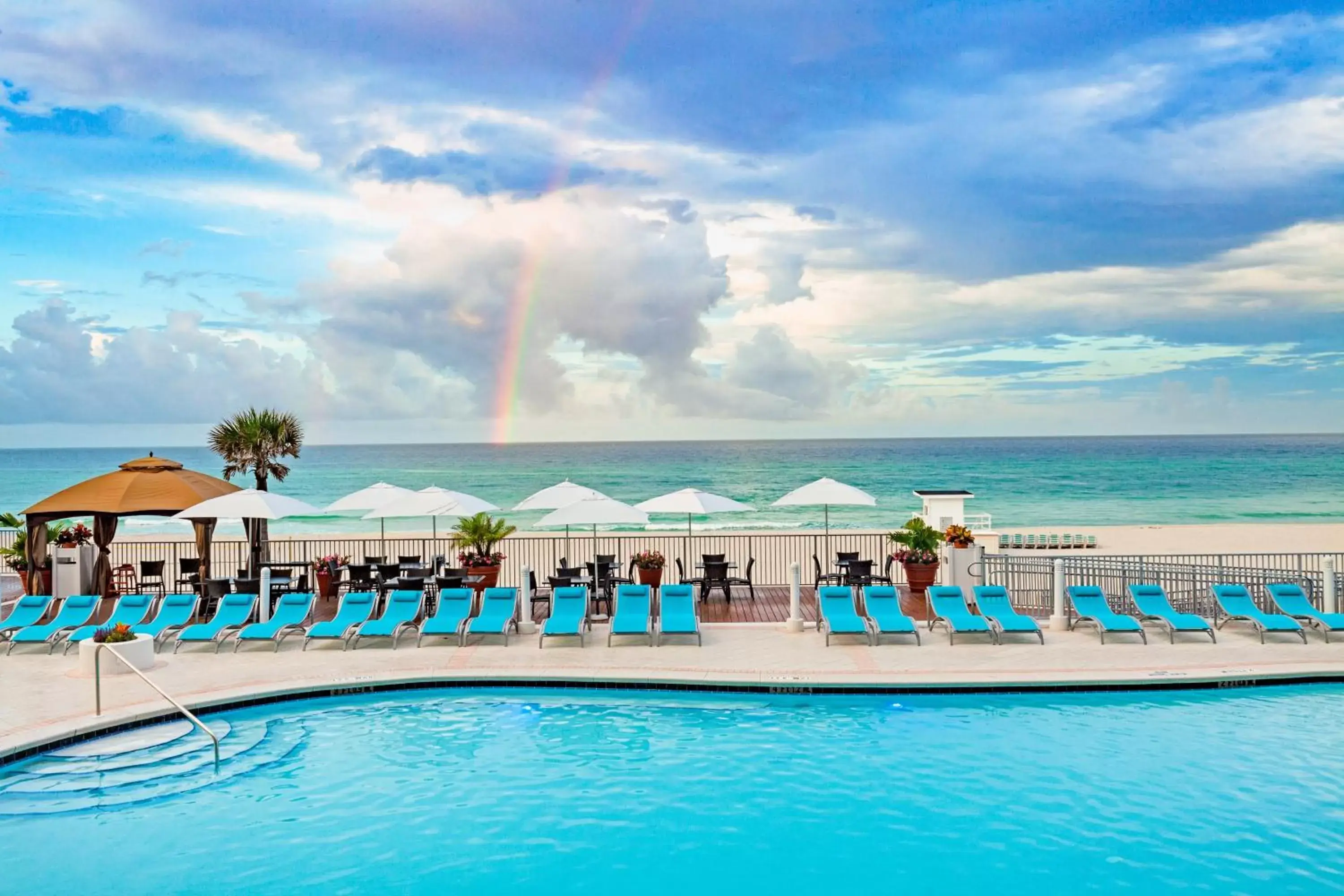 Swimming Pool in Holiday Inn Express & Suites Panama City Beach - Beachfront, an IHG Hotel