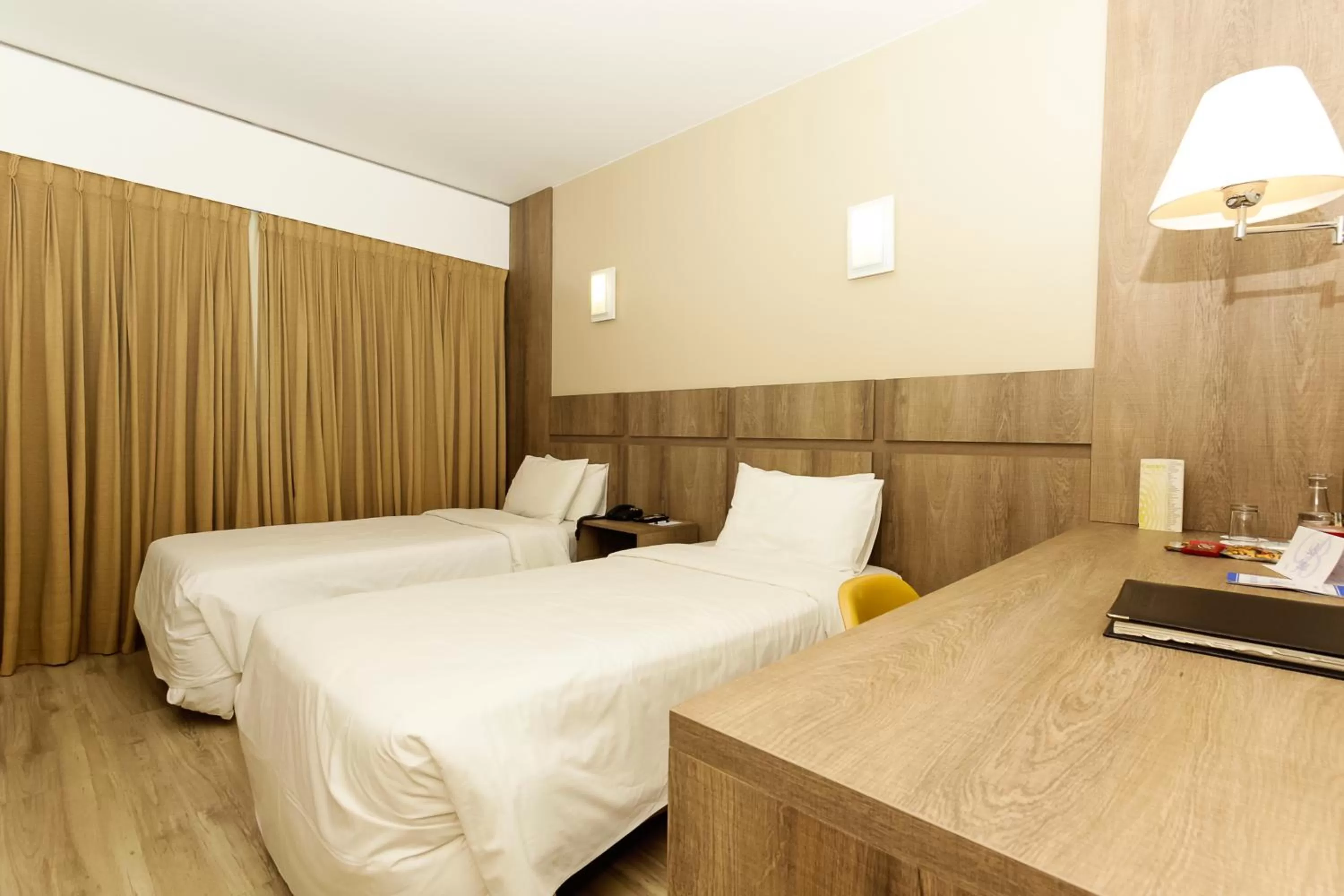 Photo of the whole room, Bed in América Bittar Hotel