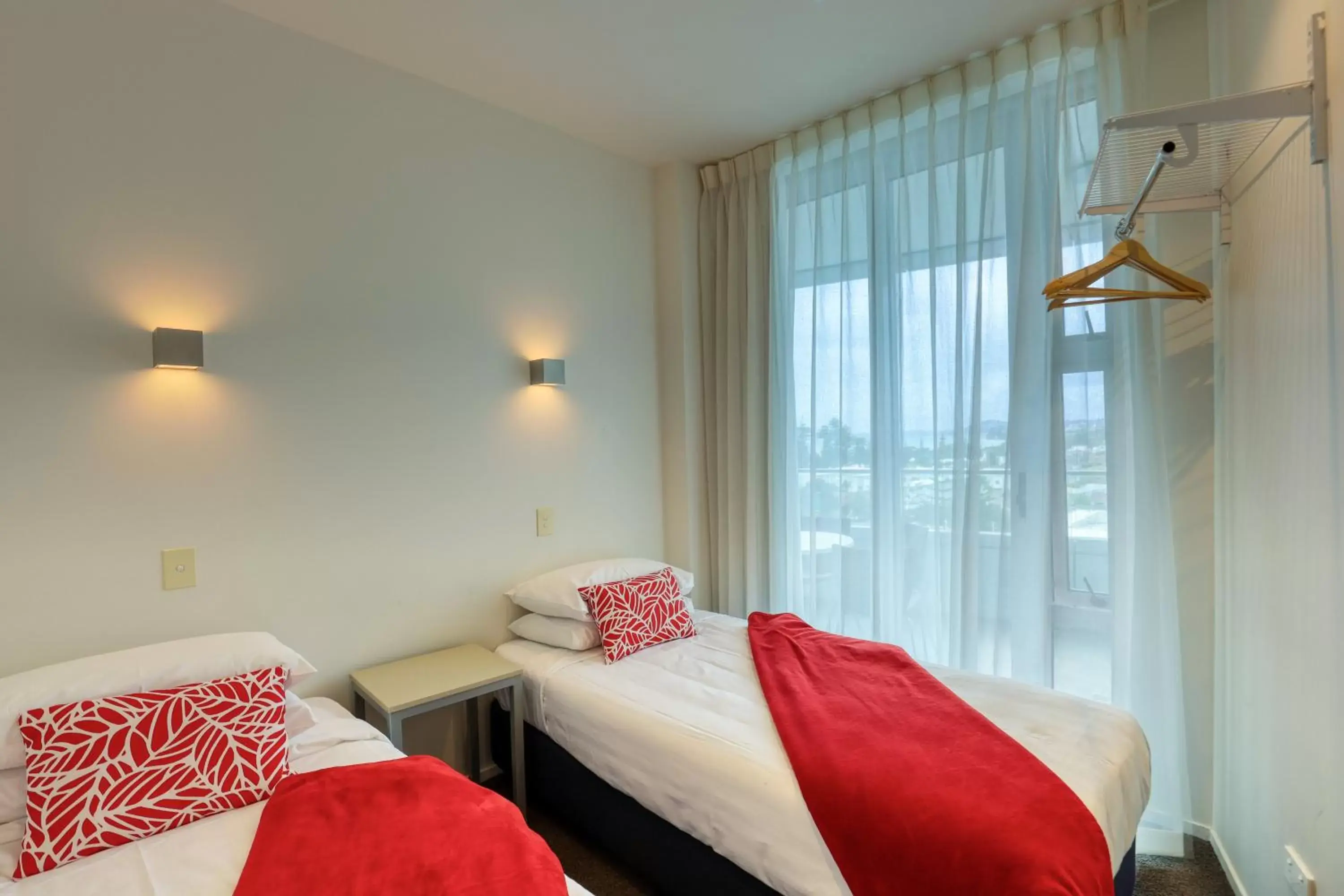 Bedroom, Bed in Ramada Suites by Wyndham Nautilus Orewa