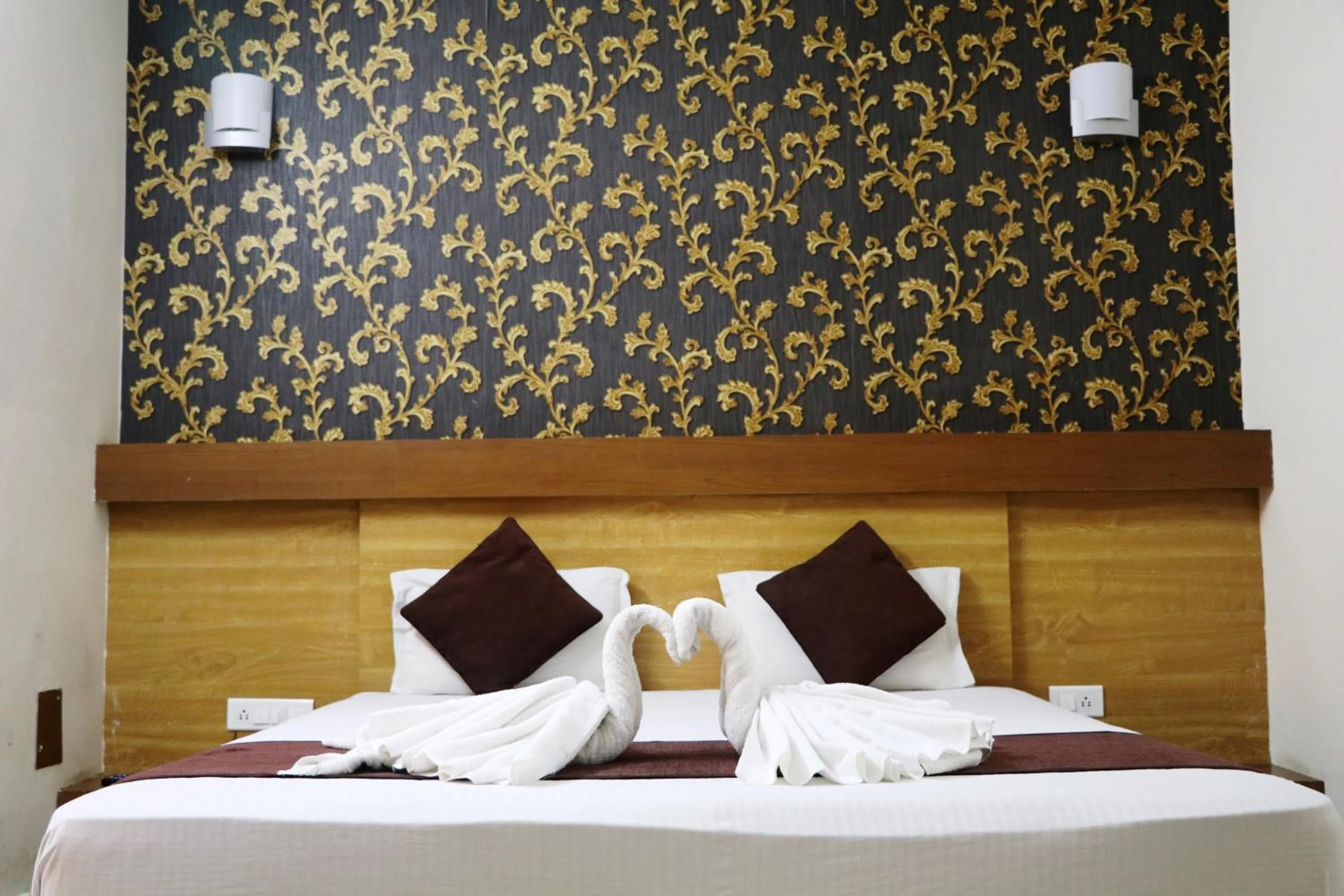 Bed in Hotel Vaishnavi