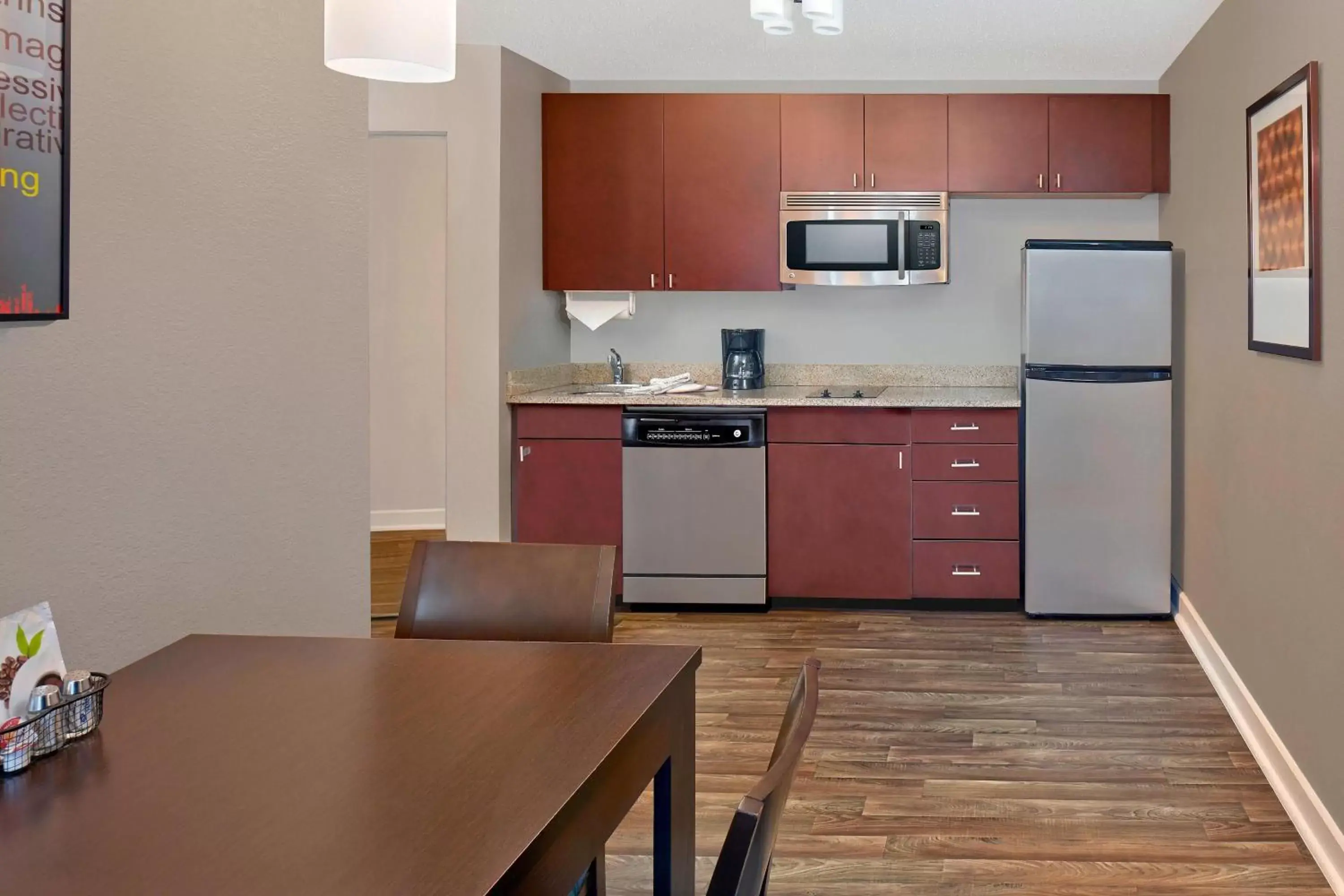 Bedroom, Kitchen/Kitchenette in TownePlace Suites by Marriott Albany Downtown/Medical Center