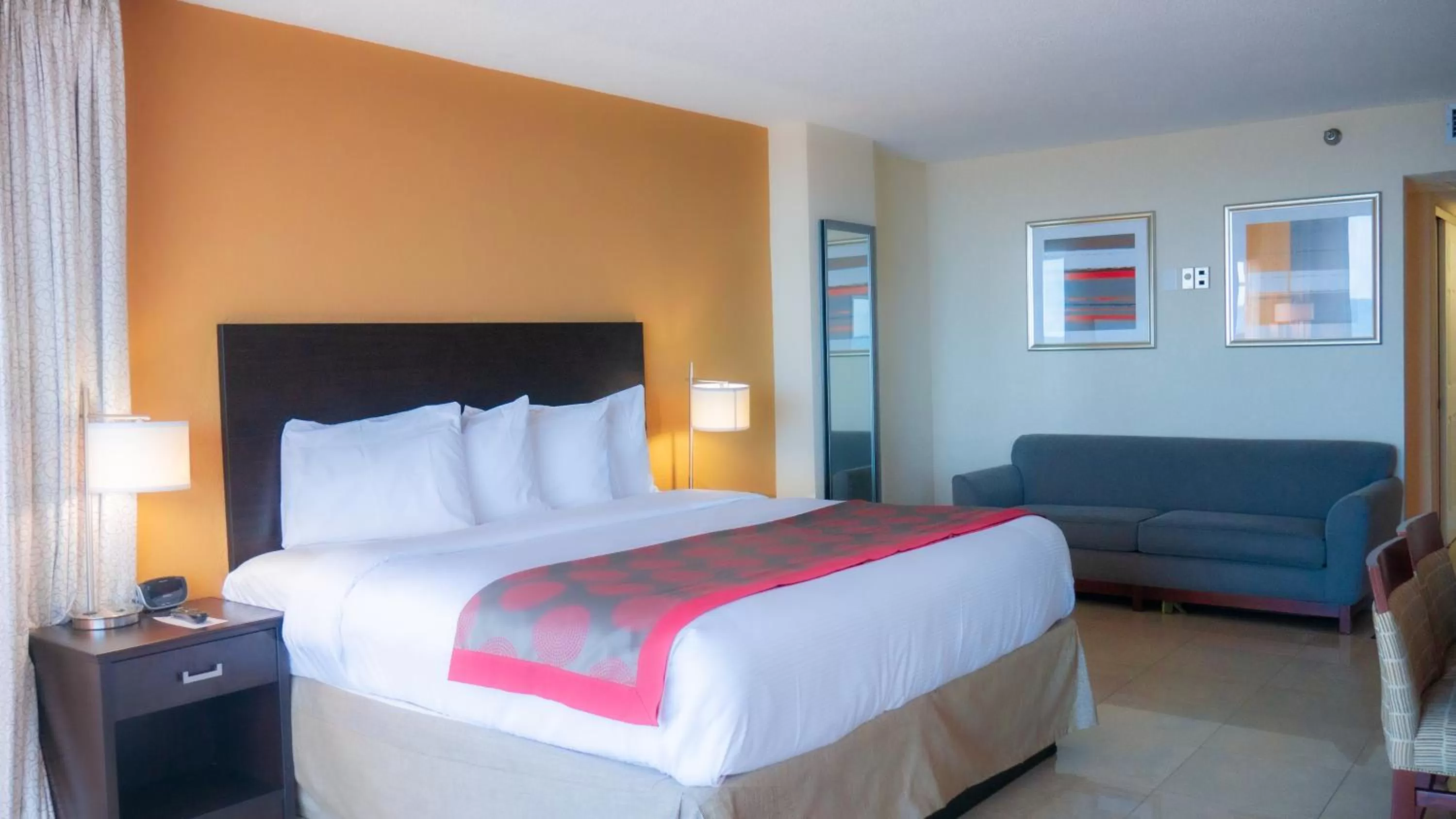 Bed in Ramada Plaza by Wyndham Marco Polo Beach Resort