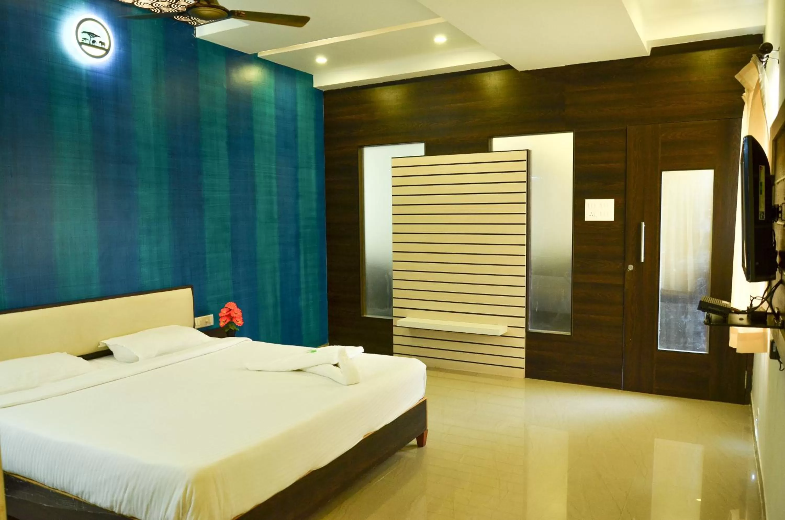 Bed in Hotel Ambai Grand
