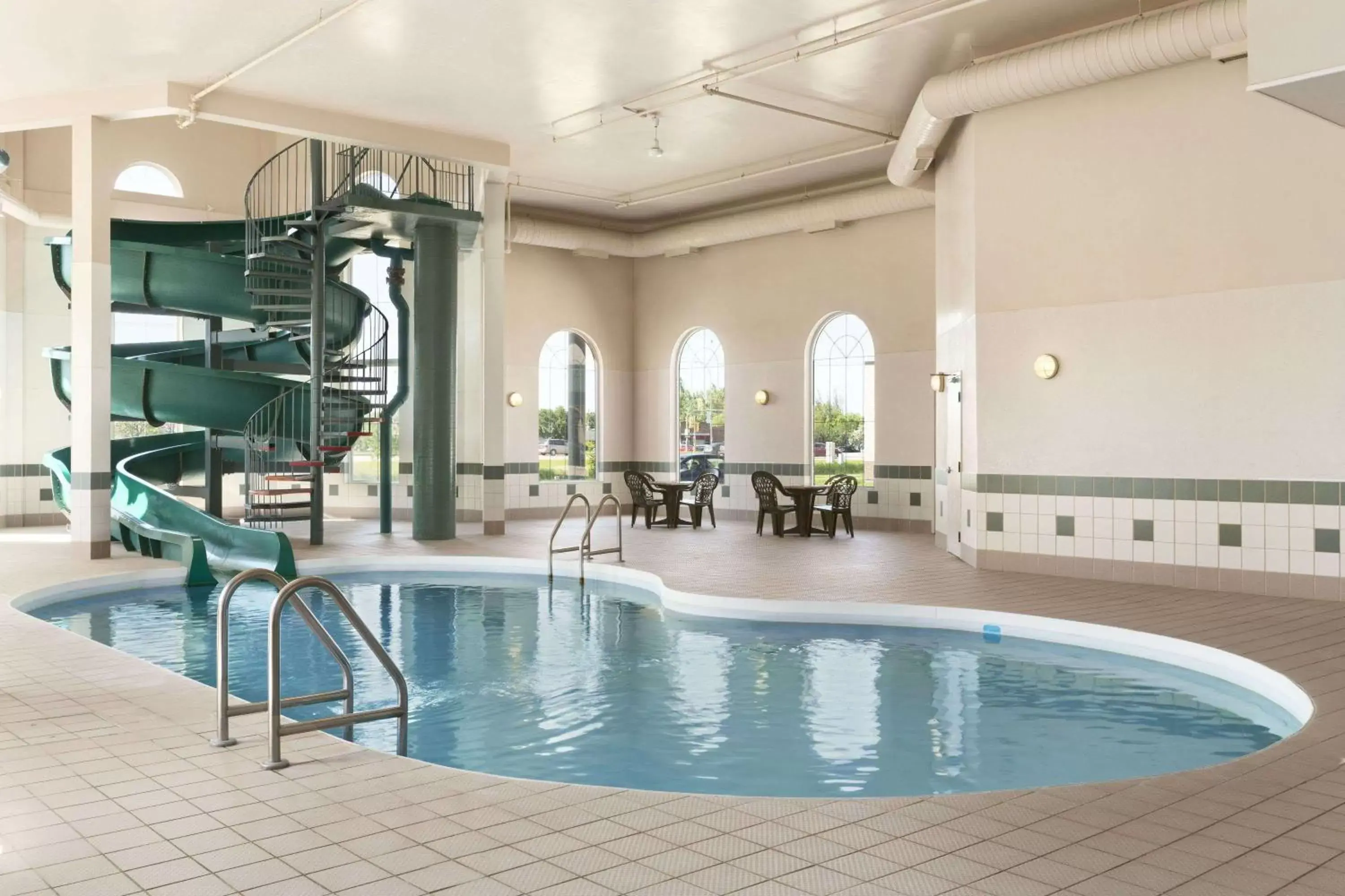 On site, Swimming Pool in Days Inn & Suites by Wyndham Winkler