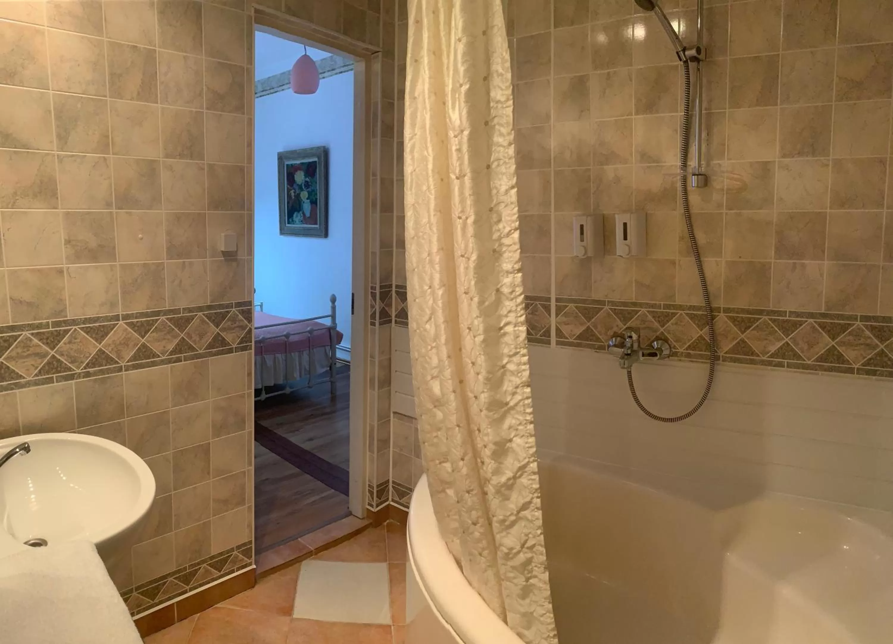 Bathroom in NB Hotel with Free Parking