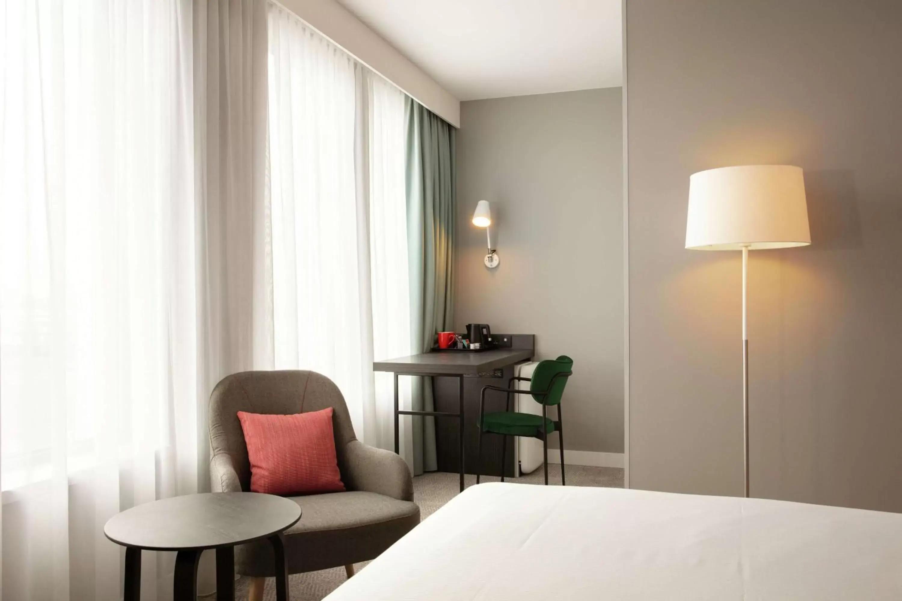 Bedroom, Seating Area in Hilton Garden Inn Paris Orly Airport