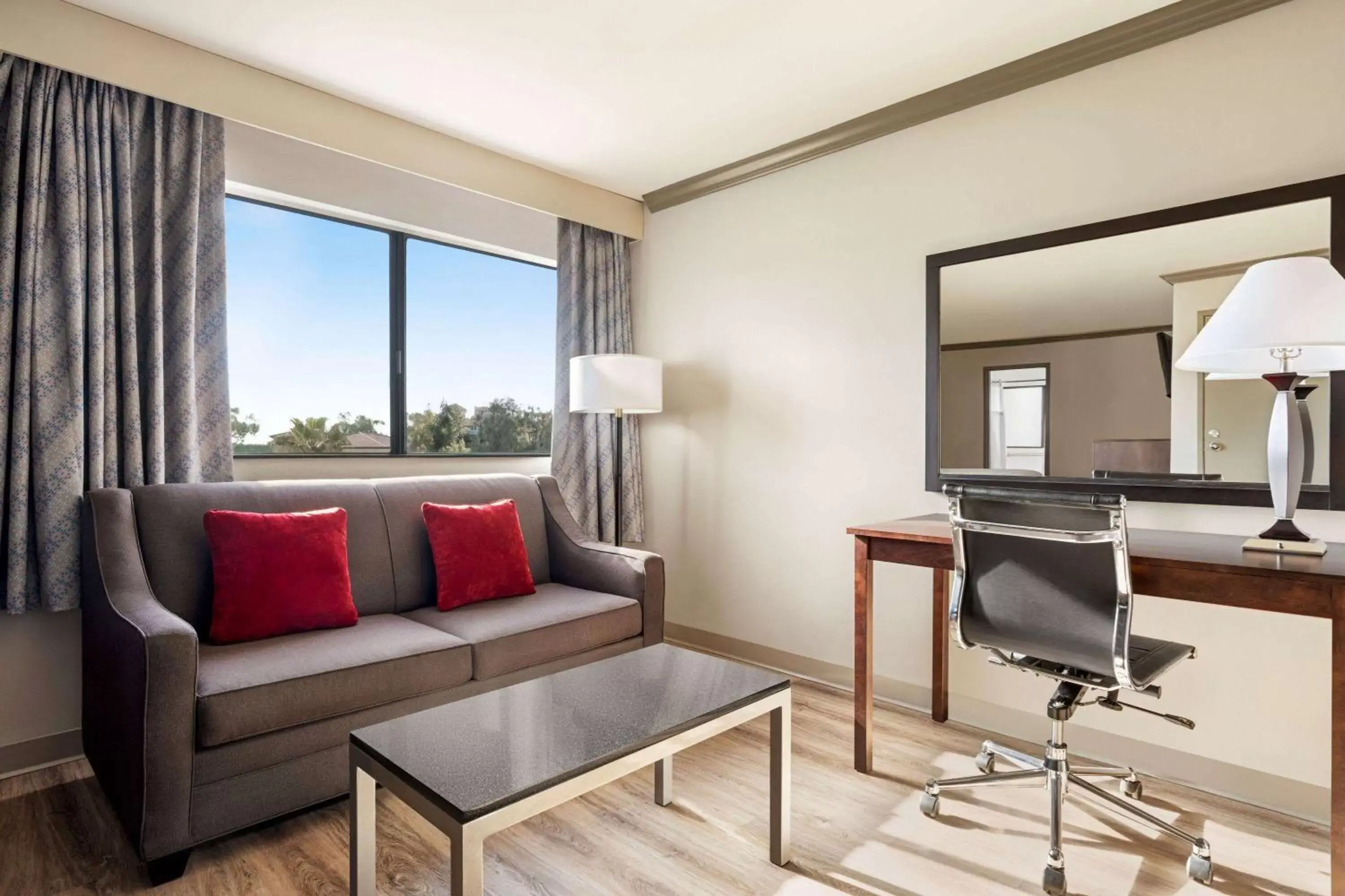 Bed, Seating Area in Baymont by Wyndham Monterey Park