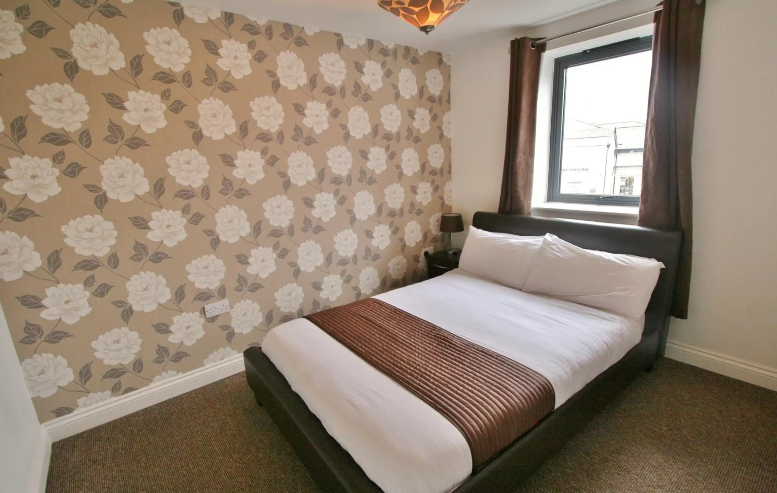 Bedroom, Bed in Central Hotel Cheltenham by Roomsbooked