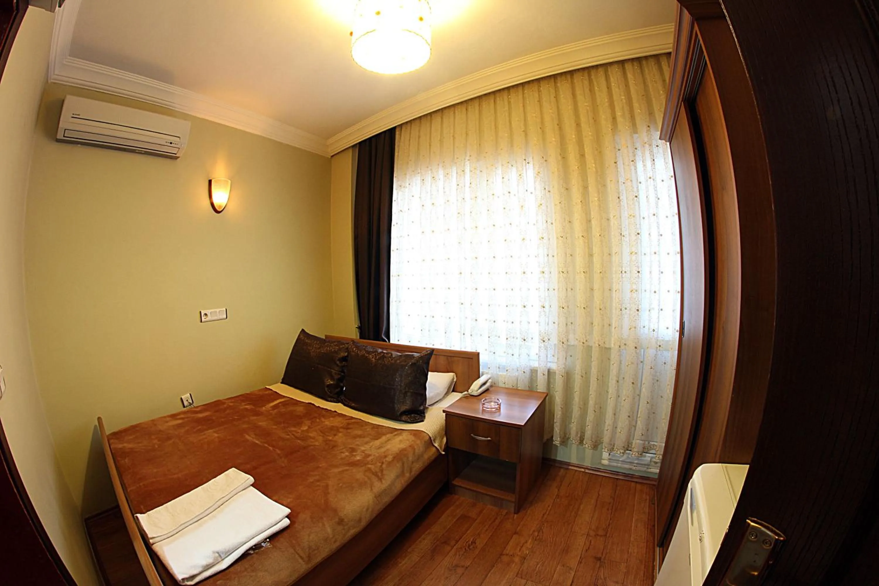 Photo of the whole room, Bed in Paradise Hotel