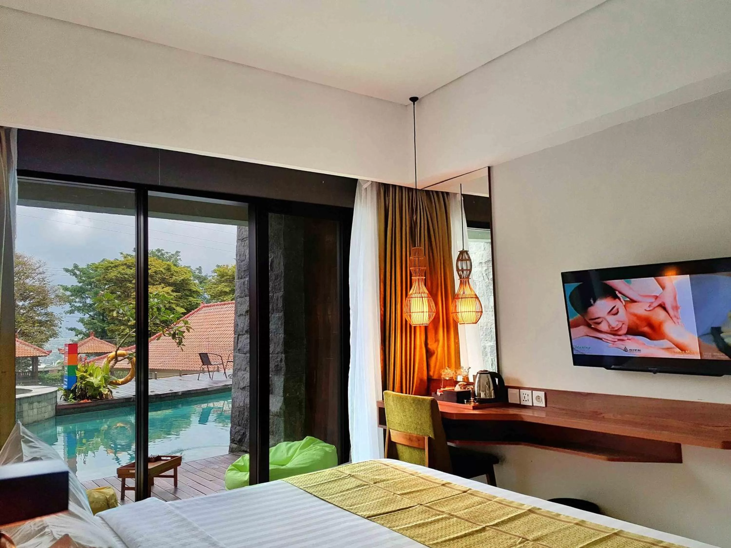Bed in The Batu Hotel & Villas