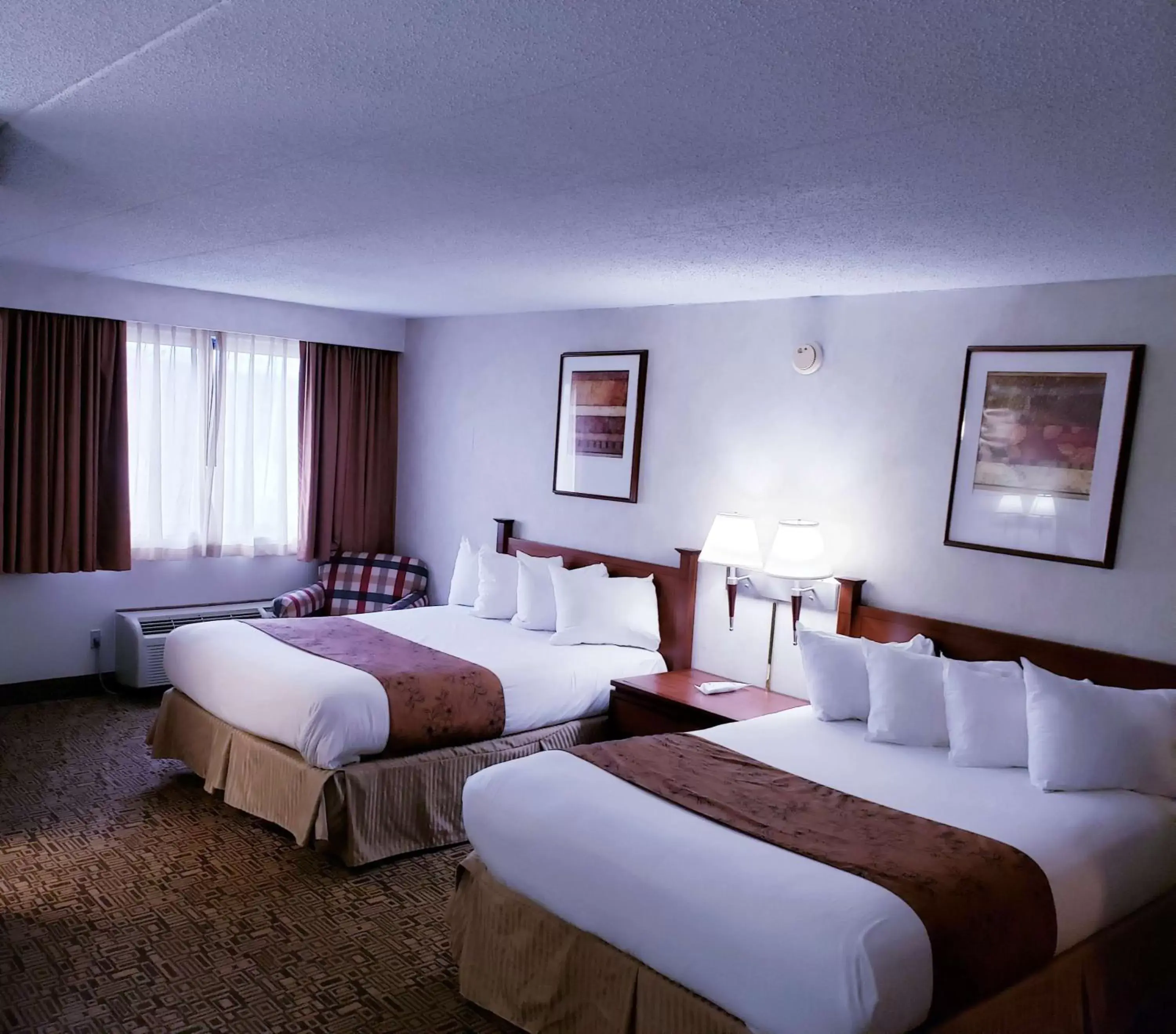 Photo of the whole room, Bed in SureStay Plus Hotel by Best Western Black River Falls