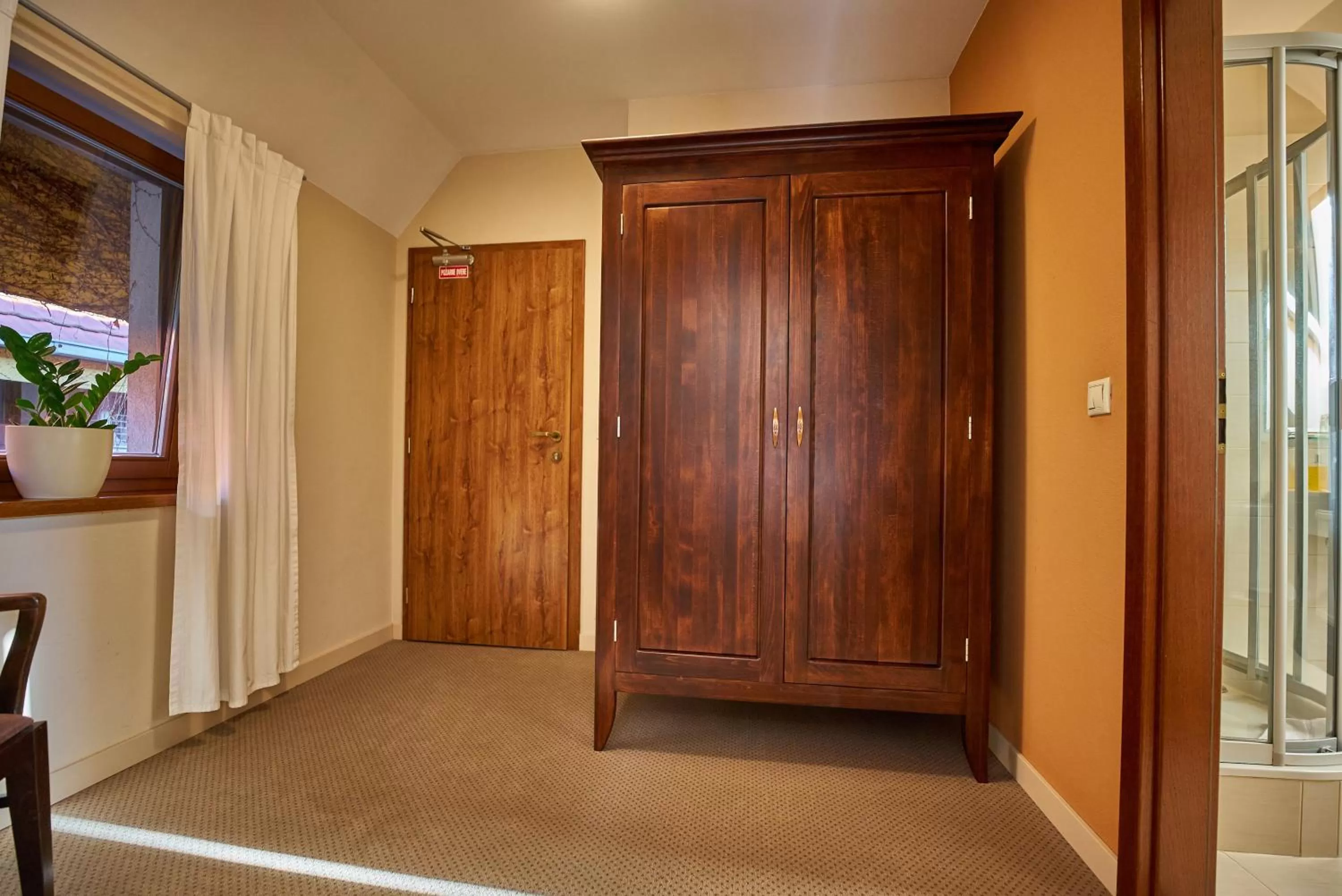 wardrobe in Pension & Restaurant PATRIOT Trnava