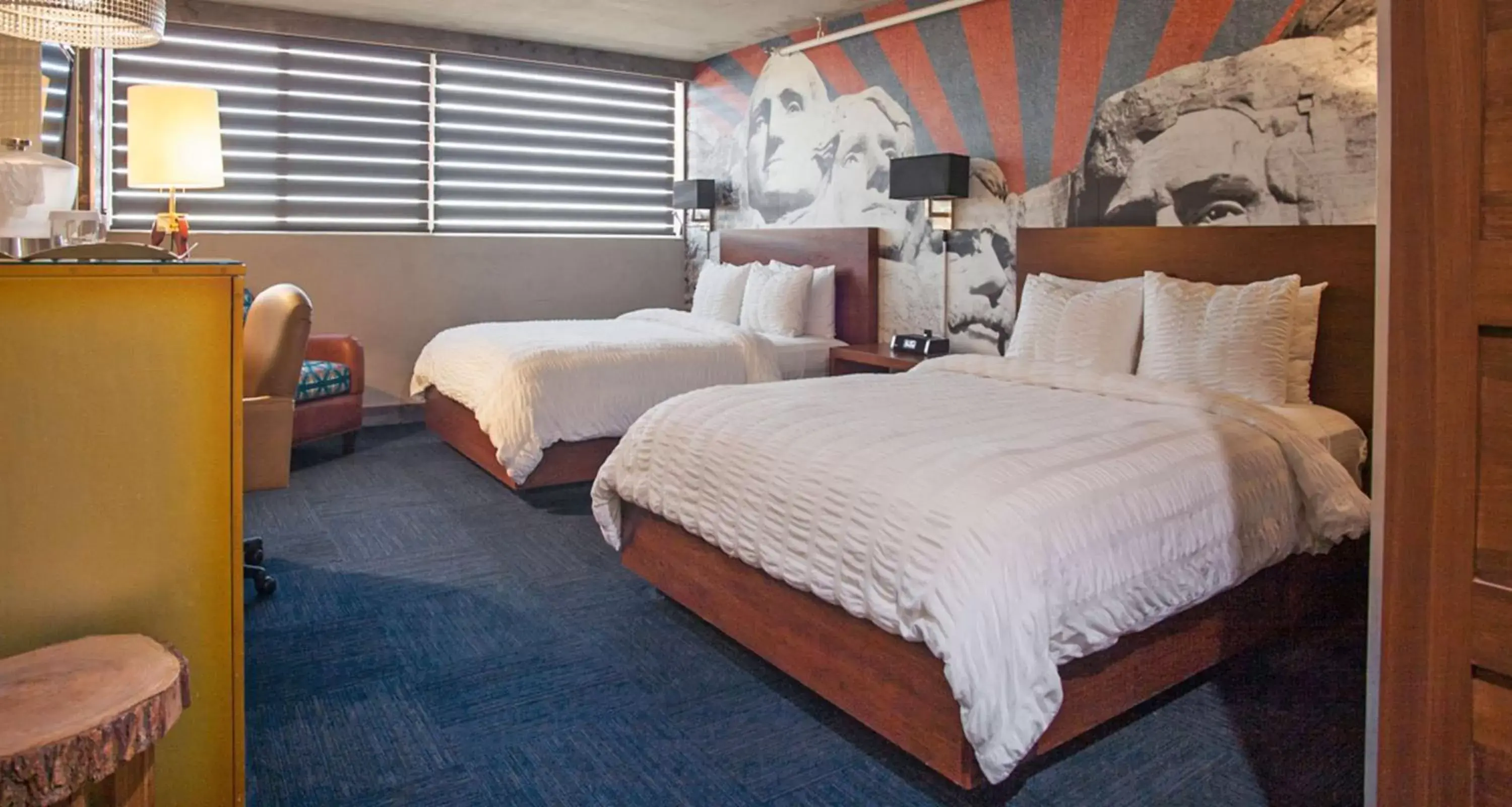 Photo of the whole room, Bed in The Rushmore Hotel & Suites; BW Premier Collection