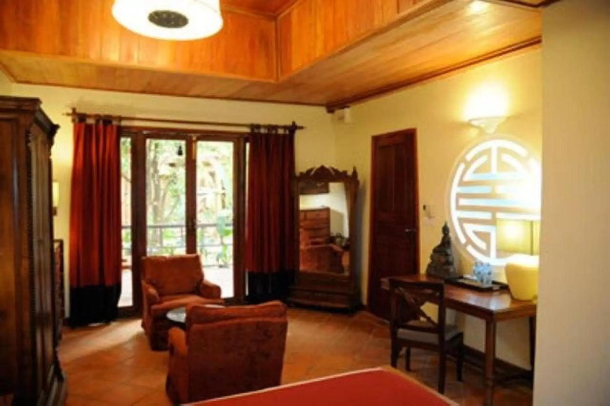 Bedroom, Seating Area in Terres Rouges Lodge