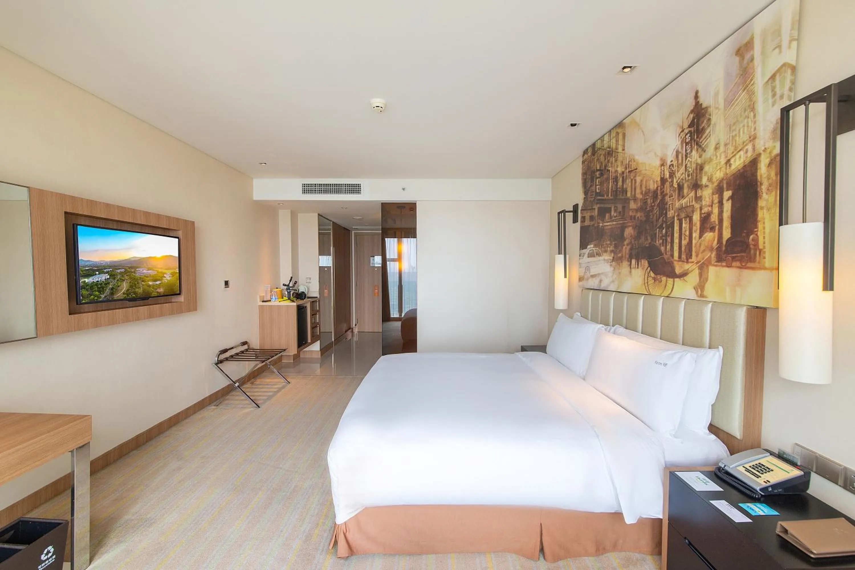 Photo of the whole room in Junluxe Hotel Guangzhou Science City-Free Shuttle Bus Service to Guangzhou Canton Fair