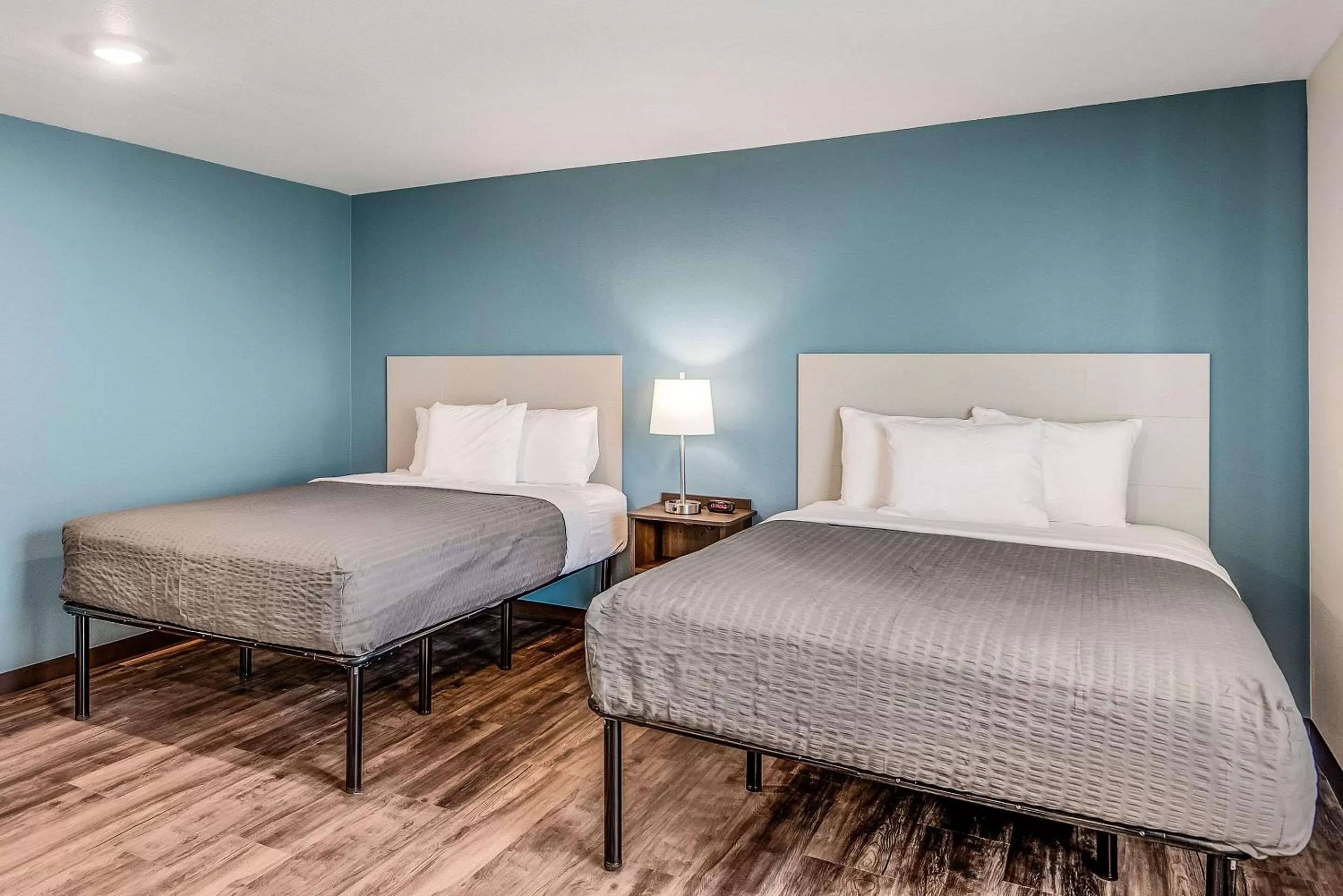 Photo of the whole room, Bed in WoodSpring Suites West Des Moines