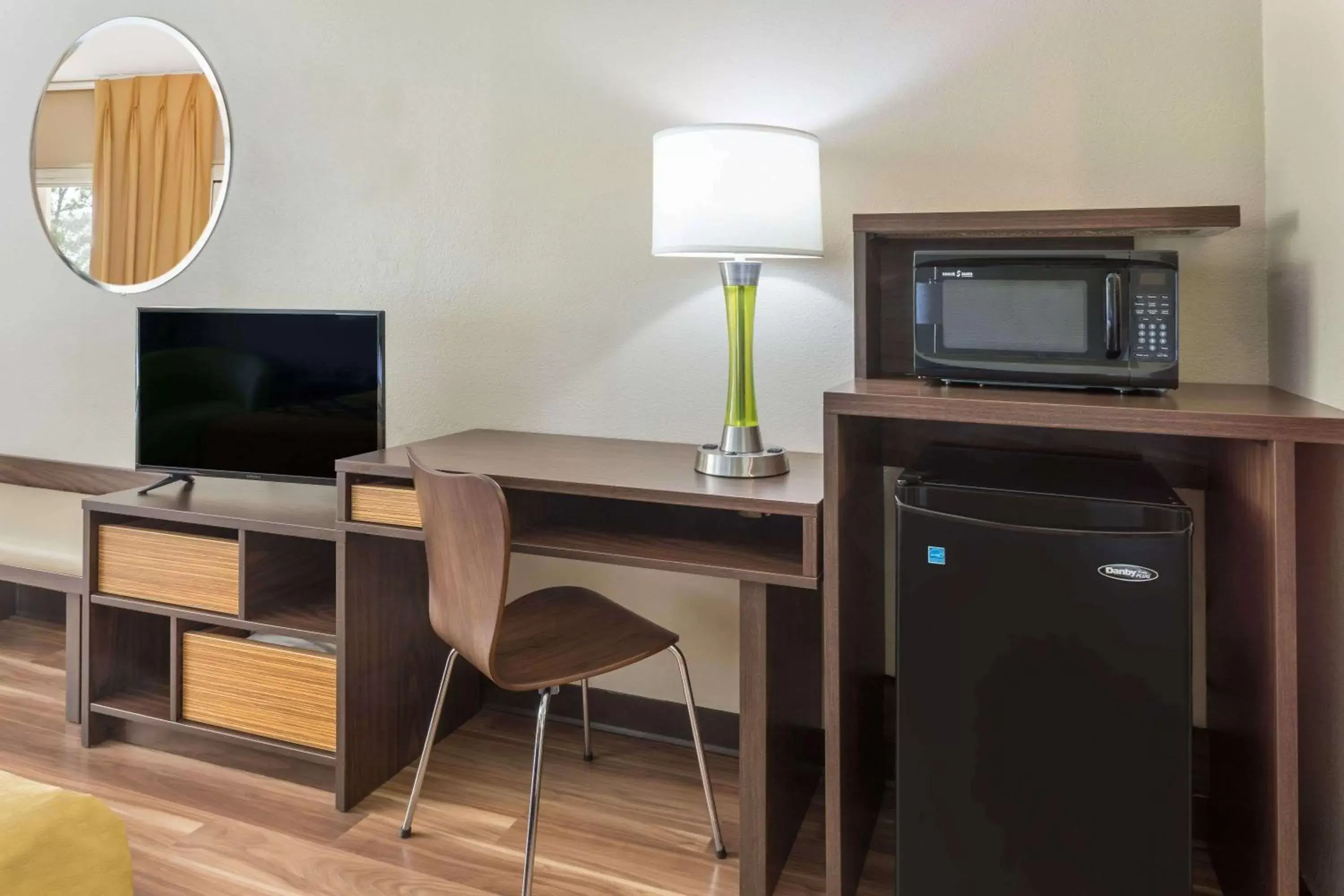 Photo of the whole room, TV/Entertainment Center in Super 8 by Wyndham Asheville Airport