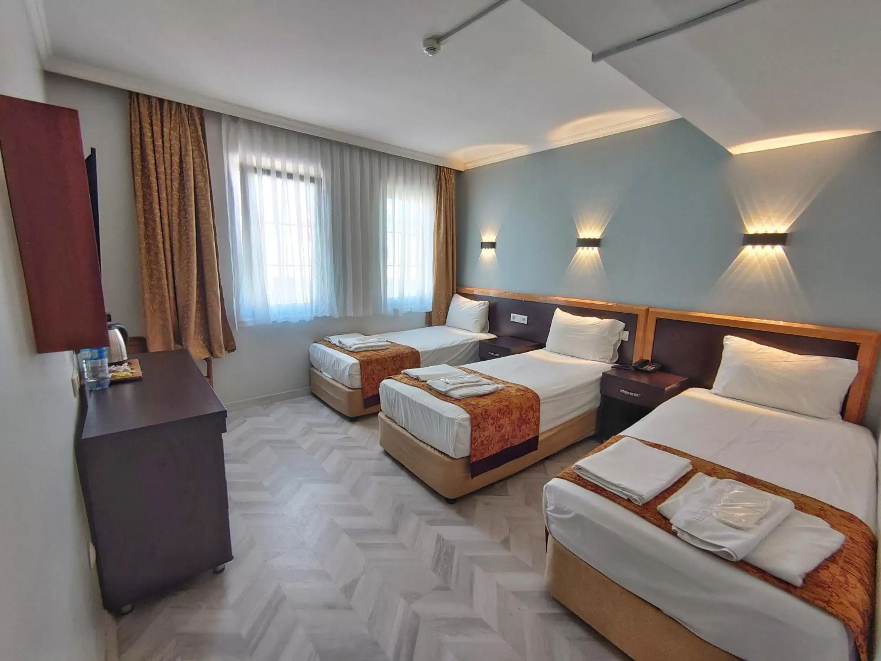 Bedroom in Orient Mintur Hotel