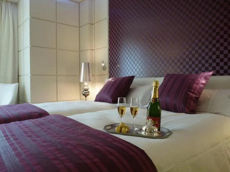 Bed in Gran Hotel Nagari Boutique & Spa