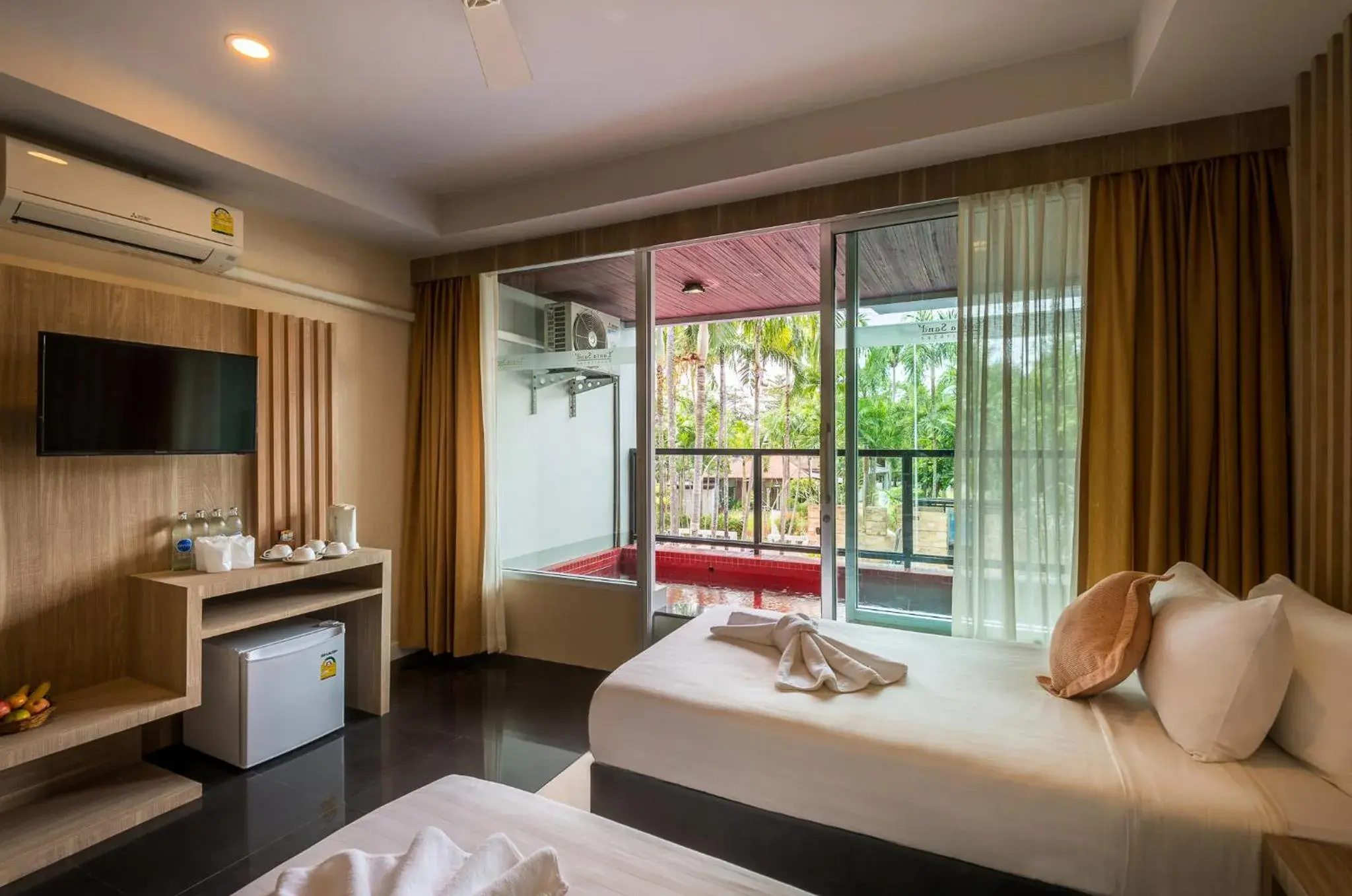 Bed in Lanta Sand Resort & Spa