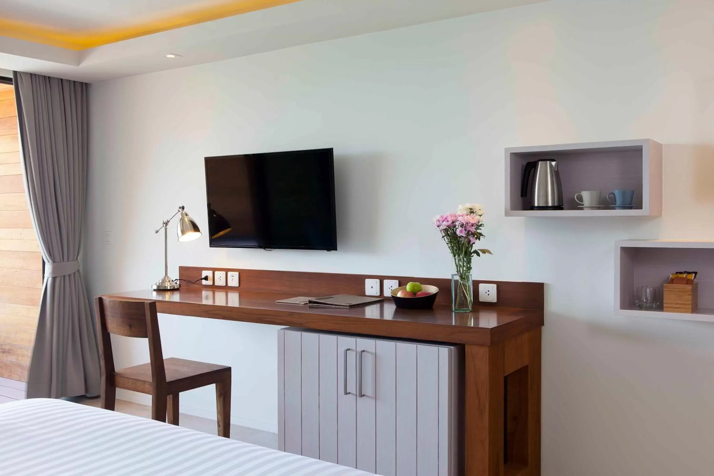 TV and multimedia, TV/Entertainment Center in Zenmaya Oceanfront Phuket, Trademark Collection by Wyndham