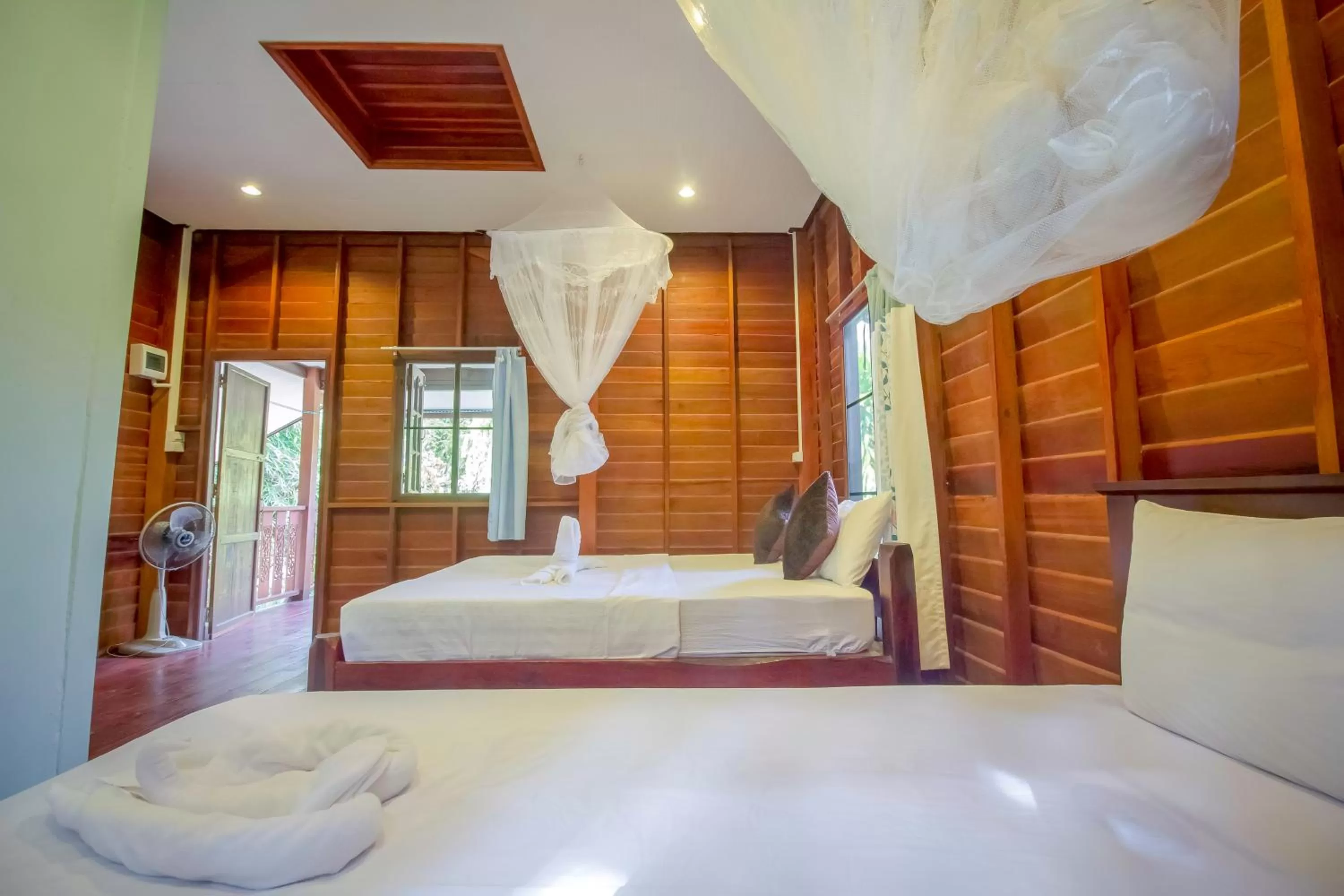 Bed in Khao Sok Palmview Resort
